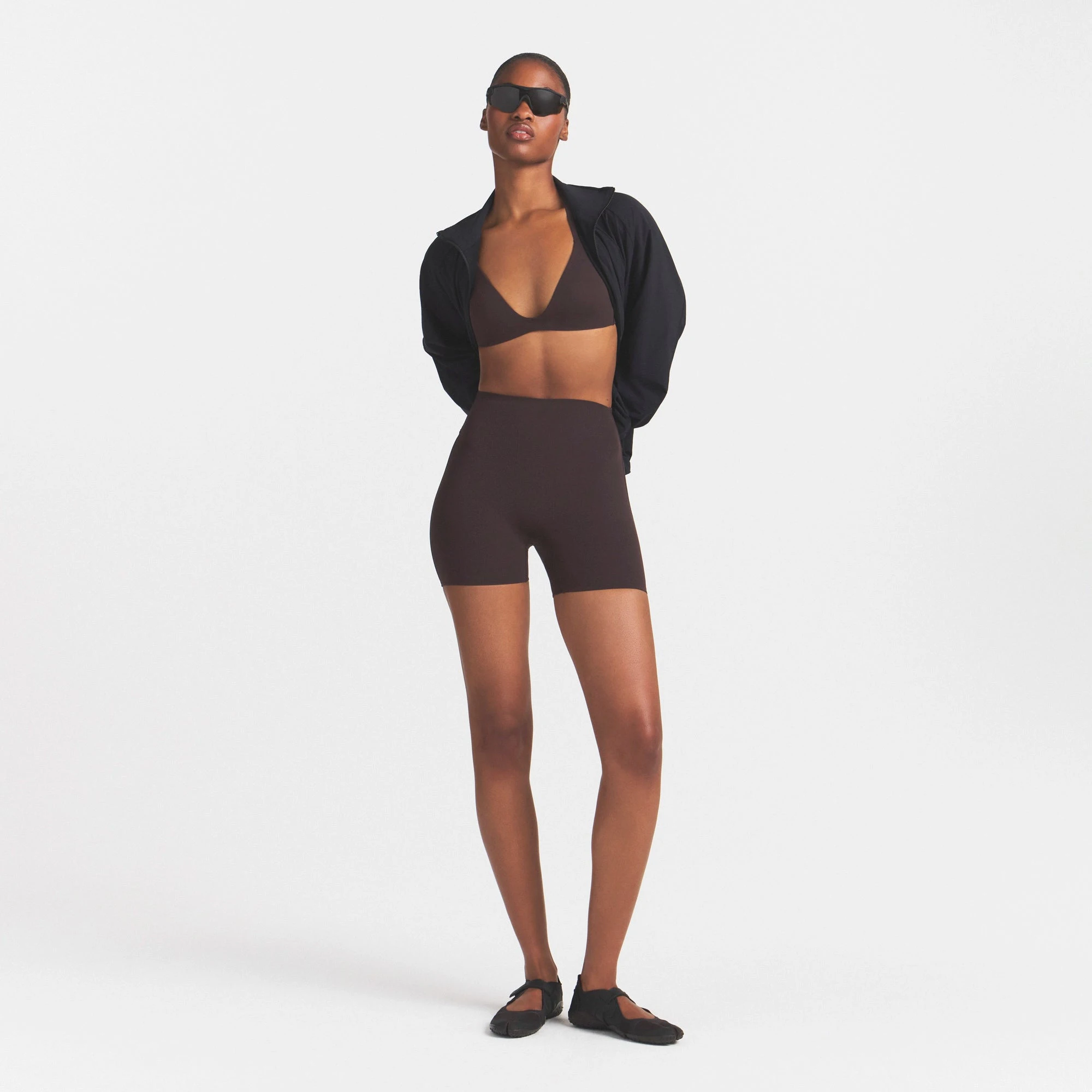 NikeSKIMS STUDIO STRETCH 5" BIKER SHORT | DARK ROASTON A MODEL FRONT VIEW @ | FOCUS: 0.0, 1.0, 0.9