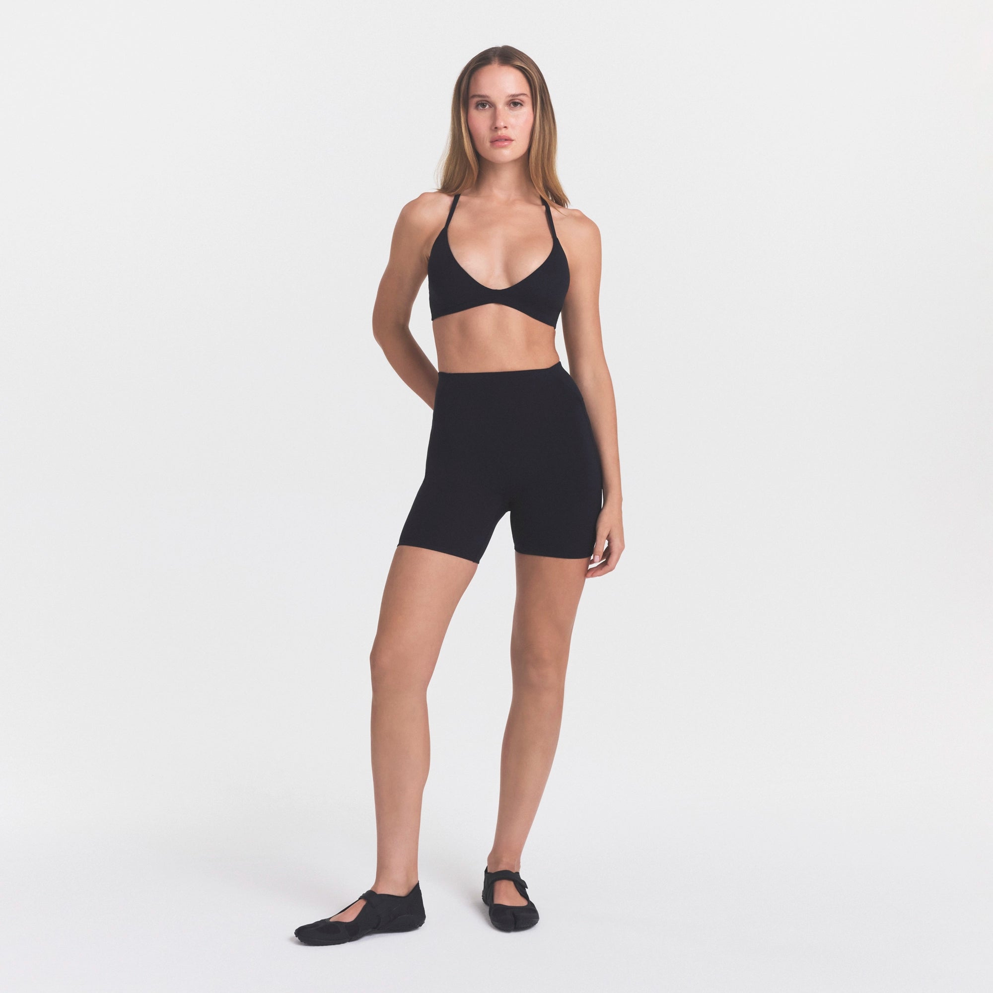 NikeSKIMS STUDIO STRETCH 5" BIKER SHORT | OBSIDIANON A MODEL FRONT 