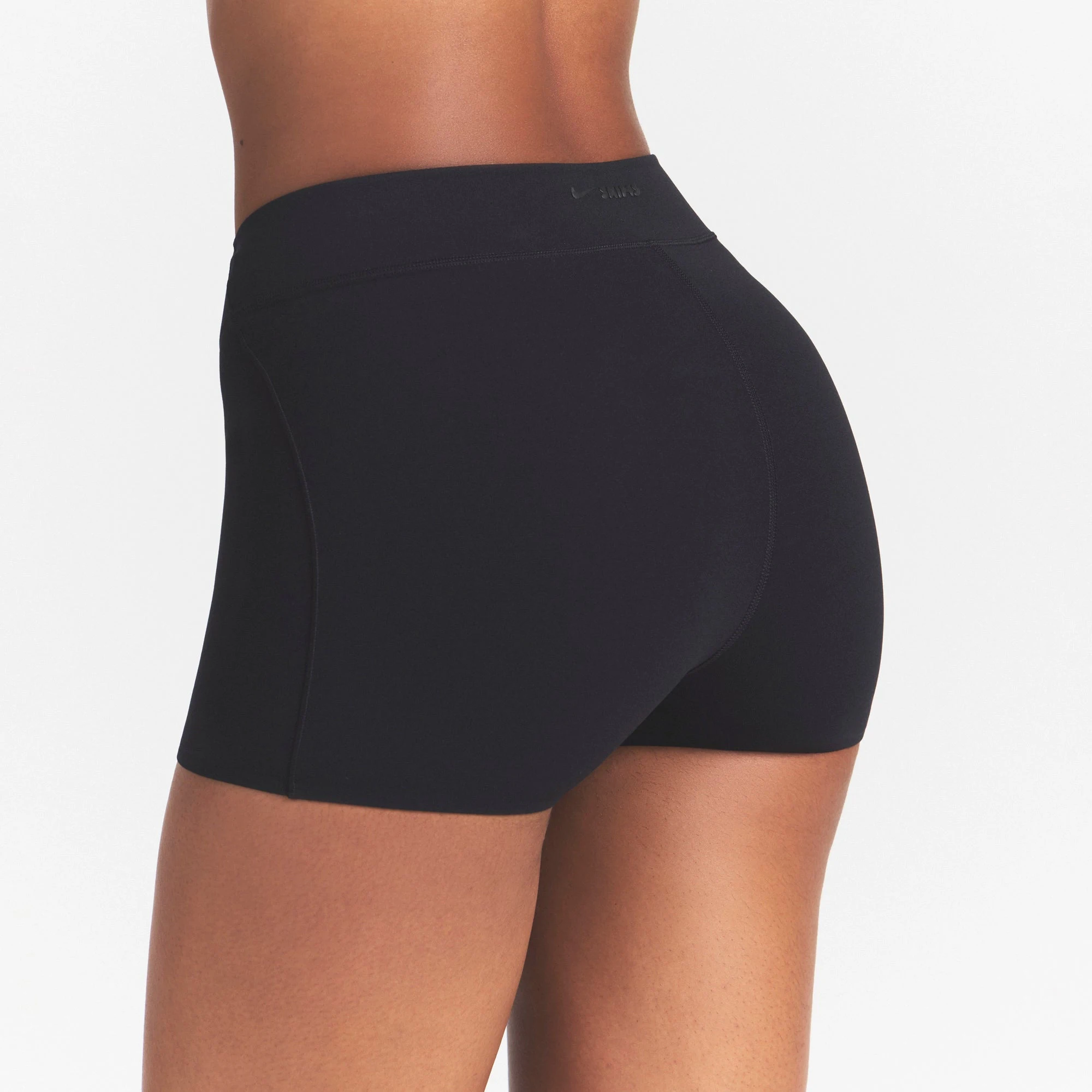 NikeSKIMS STUDIO STRETCH DIP FRONT 2" SHORT | OBSIDIANON A MODEL FRONT