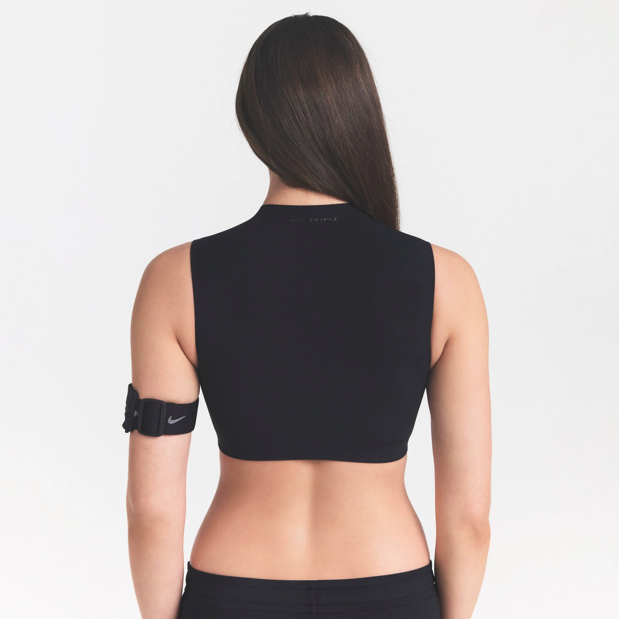NikeSKIMS STUDIO STRETCH MOCK NECK BRA | OBSIDIANON A MODEL FRONT VIEW @ | FOCUS: 0.0, 1.0, 0.9
