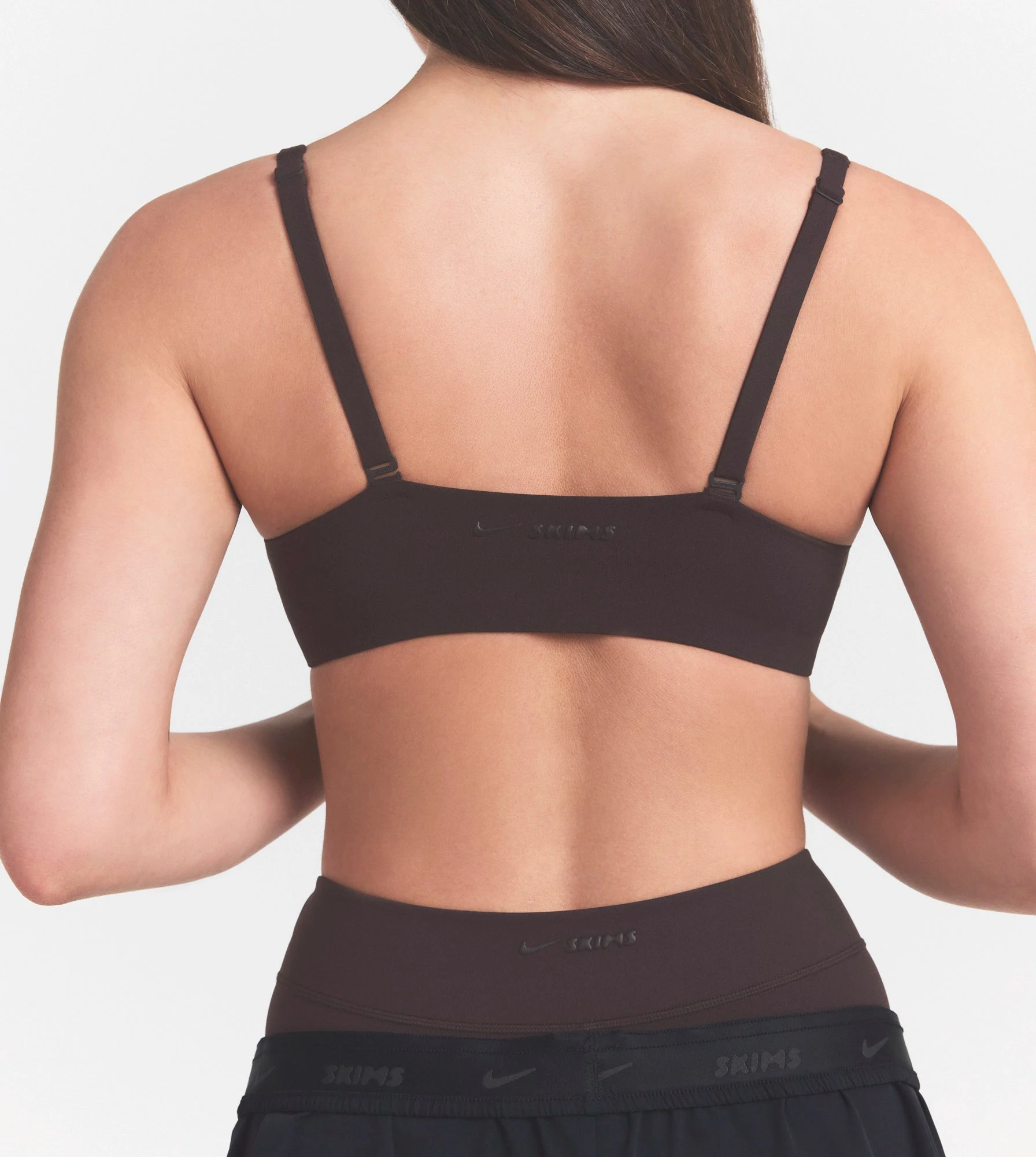 NikeSKIMS STUDIO STRETCH SEAM FRONT MICRO BRA | DARK ROASTON A MODEL FRONT VIEW @ | FOCUS: 0.0, 1.0, 0.9