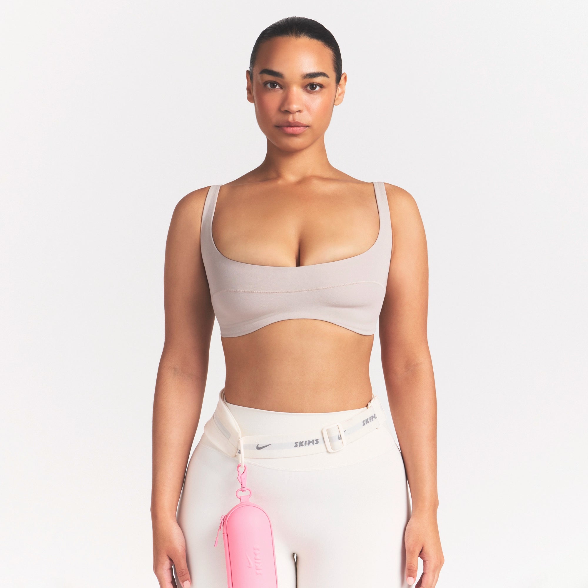 NikeSKIMS STUDIO STRETCH  SEAM FRONT MICRO BRA | LINENON A MODEL FRONT VIEW @ | FOCUS: 0.0, 1.0, 0.9