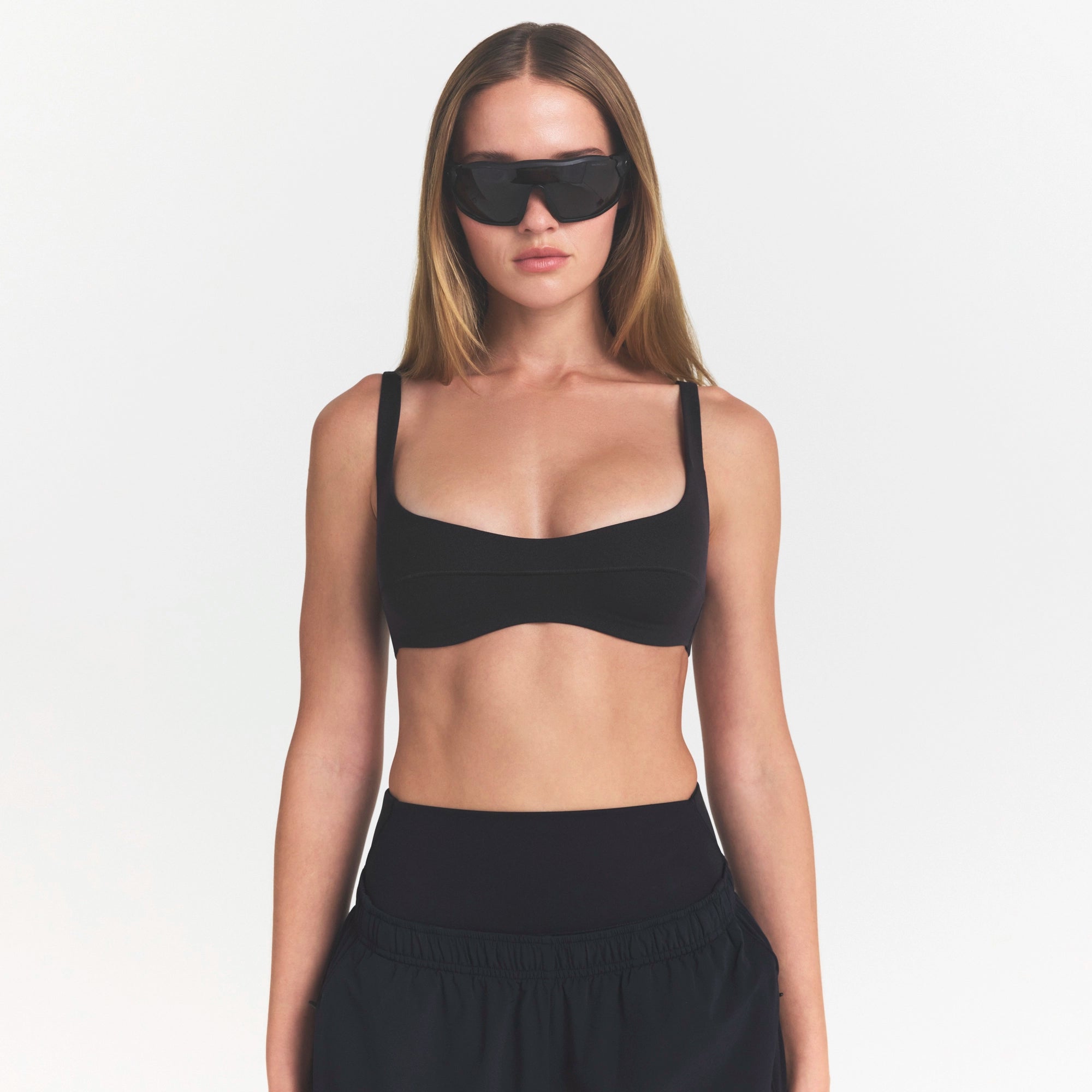 NikeSKIMS STUDIO STRETCH  SEAM FRONT MICRO BRA | OBSIDIANON A MODEL FRONT VIEW @ | FOCUS: 0.0, 1.0, 0.9