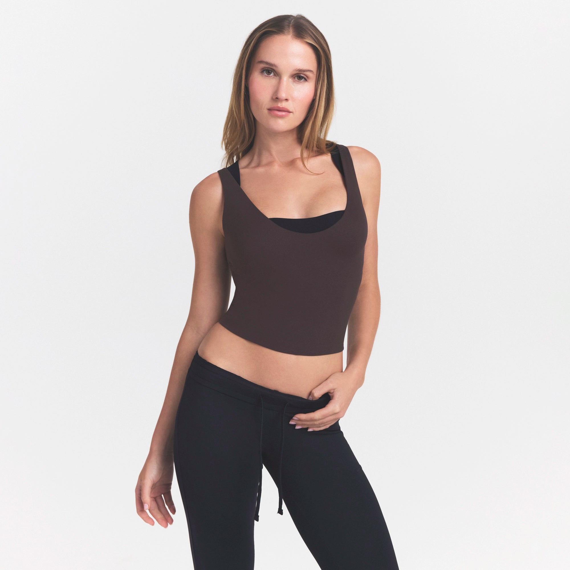 NikeSKIMS STUDIO STRETCH PLUNGE TANK | DARK ROASTON A MODEL FRONT VIEW @ | FOCUS: 0.0, 1.0, 0.9