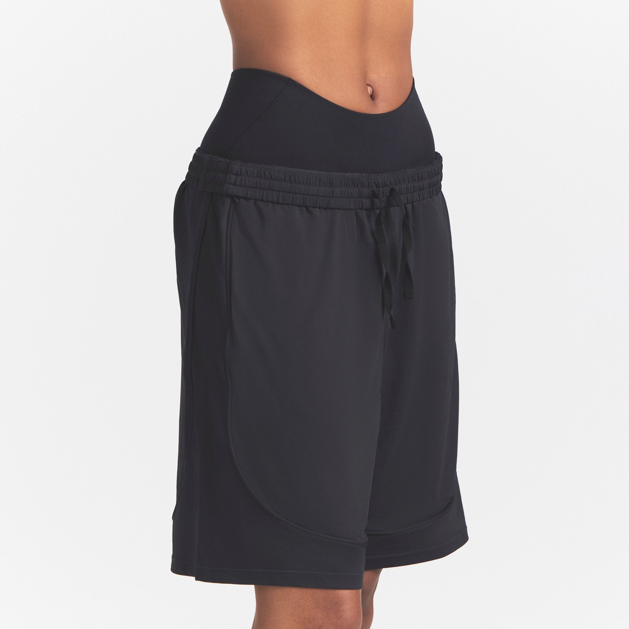 NikeSKIMS AIRY RELAXED SHORT | NSKM OBSIDIAN ON A MODEL 