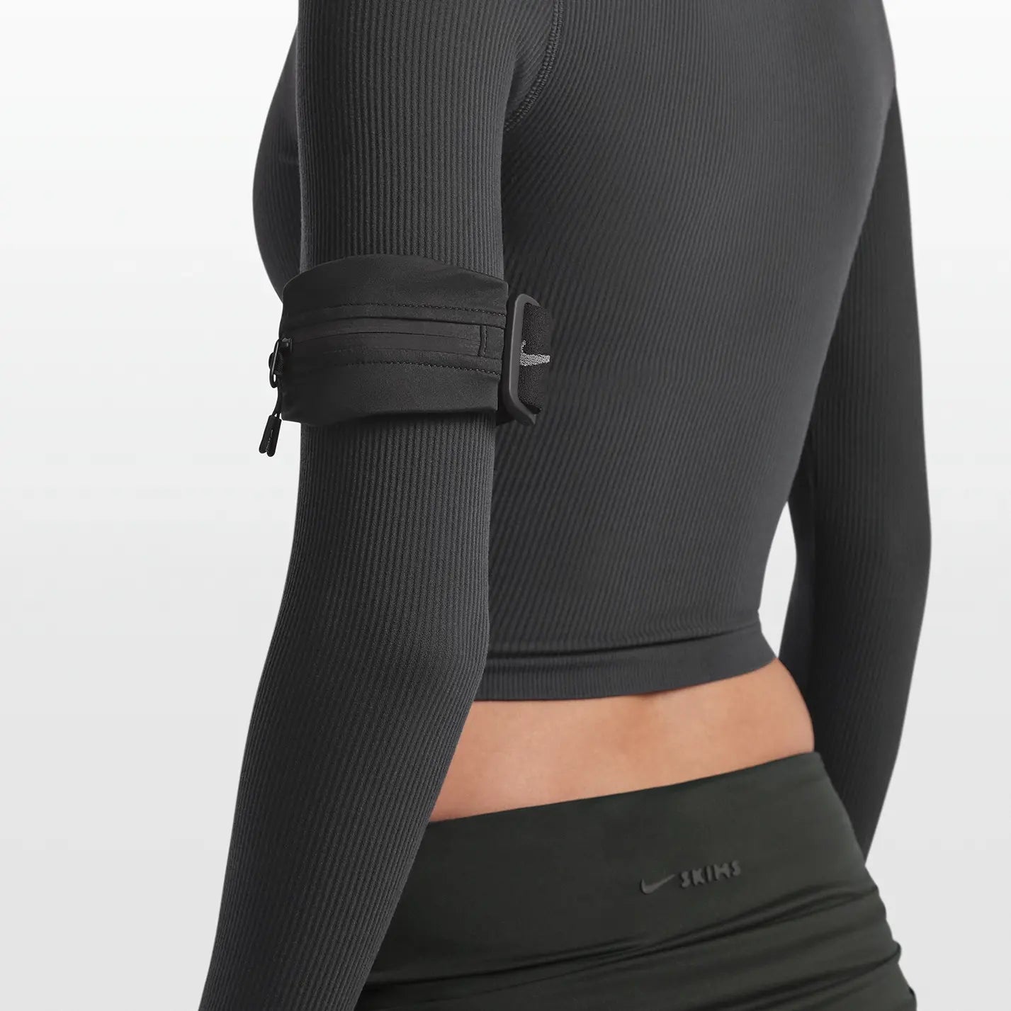 NikeSKIMS ACCESSORIES ARMBAND | OBSIDIAN & LAYS FLAT ON A WHITE BACKGROUND | FLT