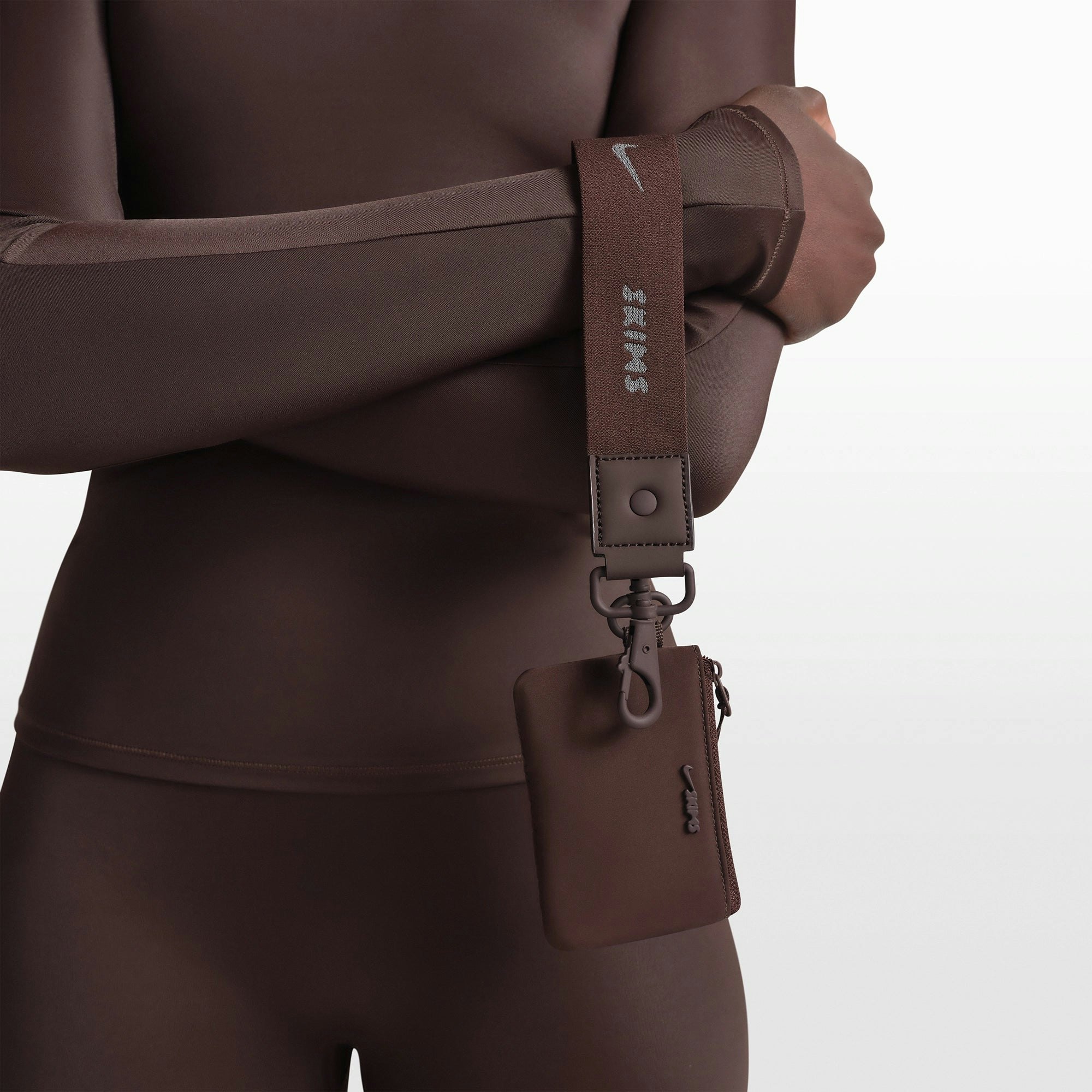 NikeSKIMS ACCESSORIES CLIPPABLE POUCH | PHOENIX FLAT ON A WHITE BACKGROUND