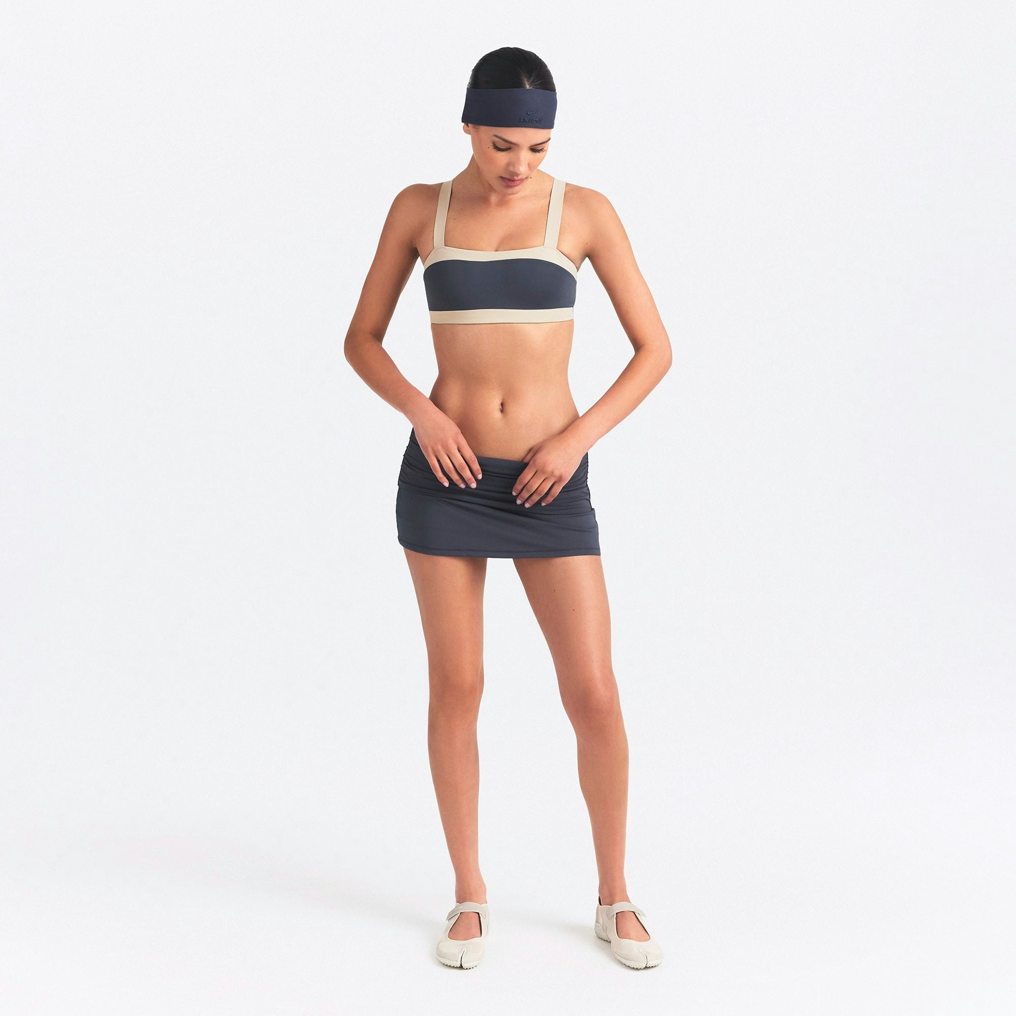 NikeSKIMS FOOTWEAR RIFT MESH | LT BONE/LT BONE-LT OREWOOD BRN ON A MODEL FRONT VIEW @ | FOCUS: 0.0, 1.0, 0.9