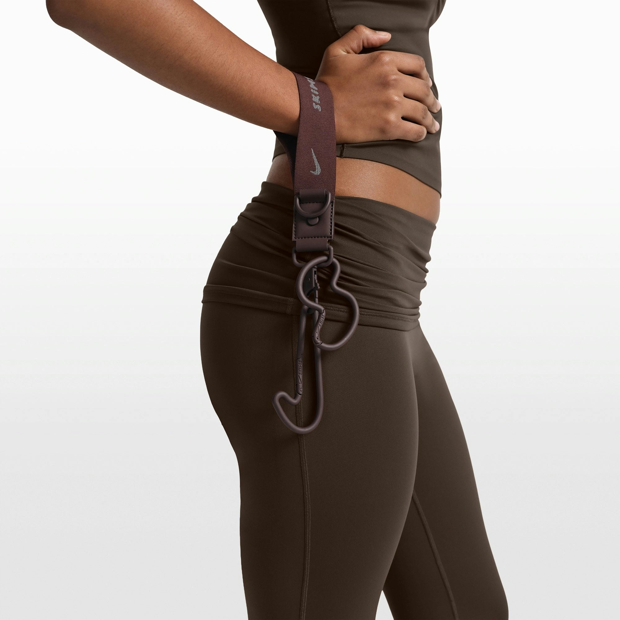 NikeSKIMS ACCESSORIES CARABINER SET | PHOENIX FLAT ON A WHITE BACKGROUND