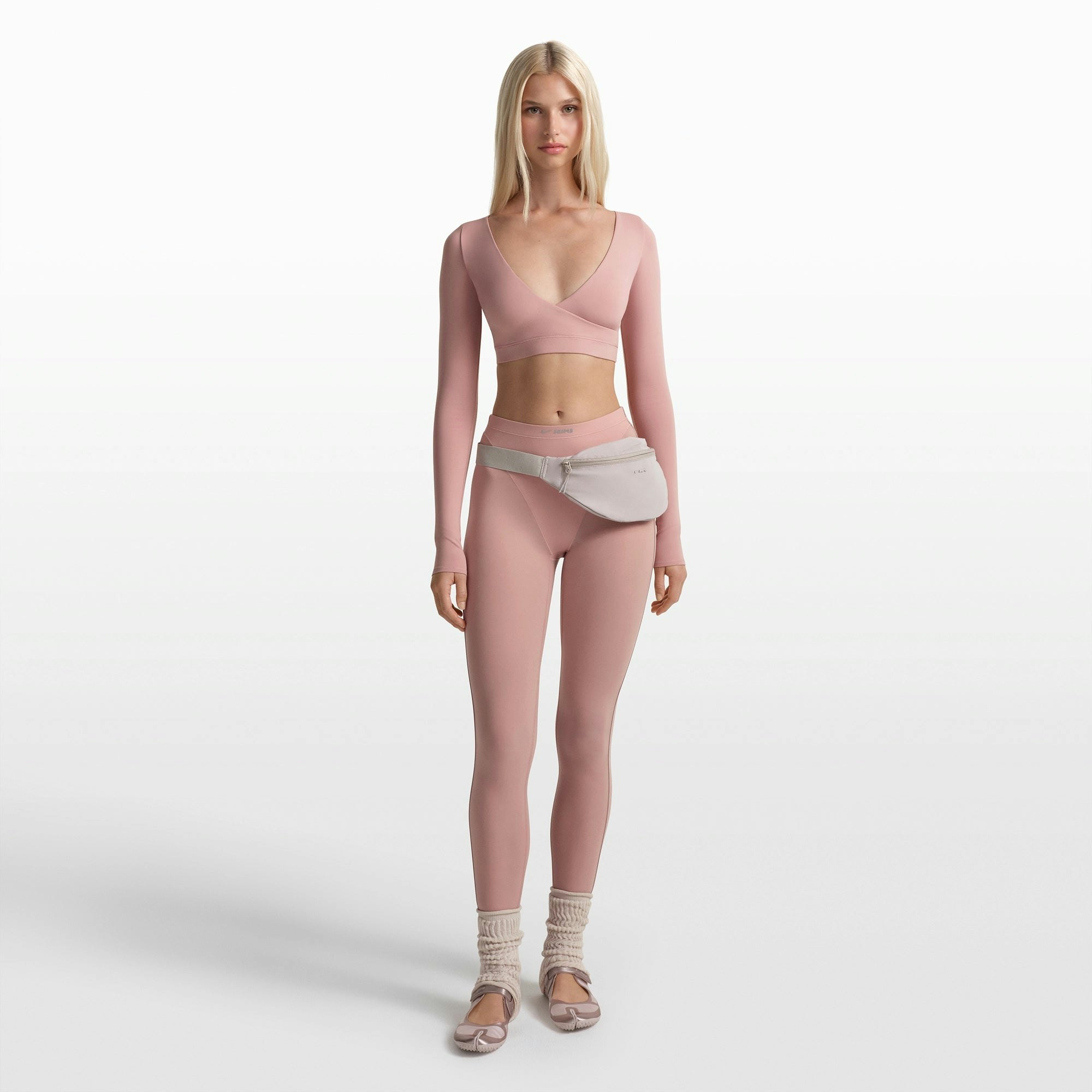 NikeSKIMS ACCESSORIES FANNY PACK | STONE FLAT ON A WHITE BACKGROUND