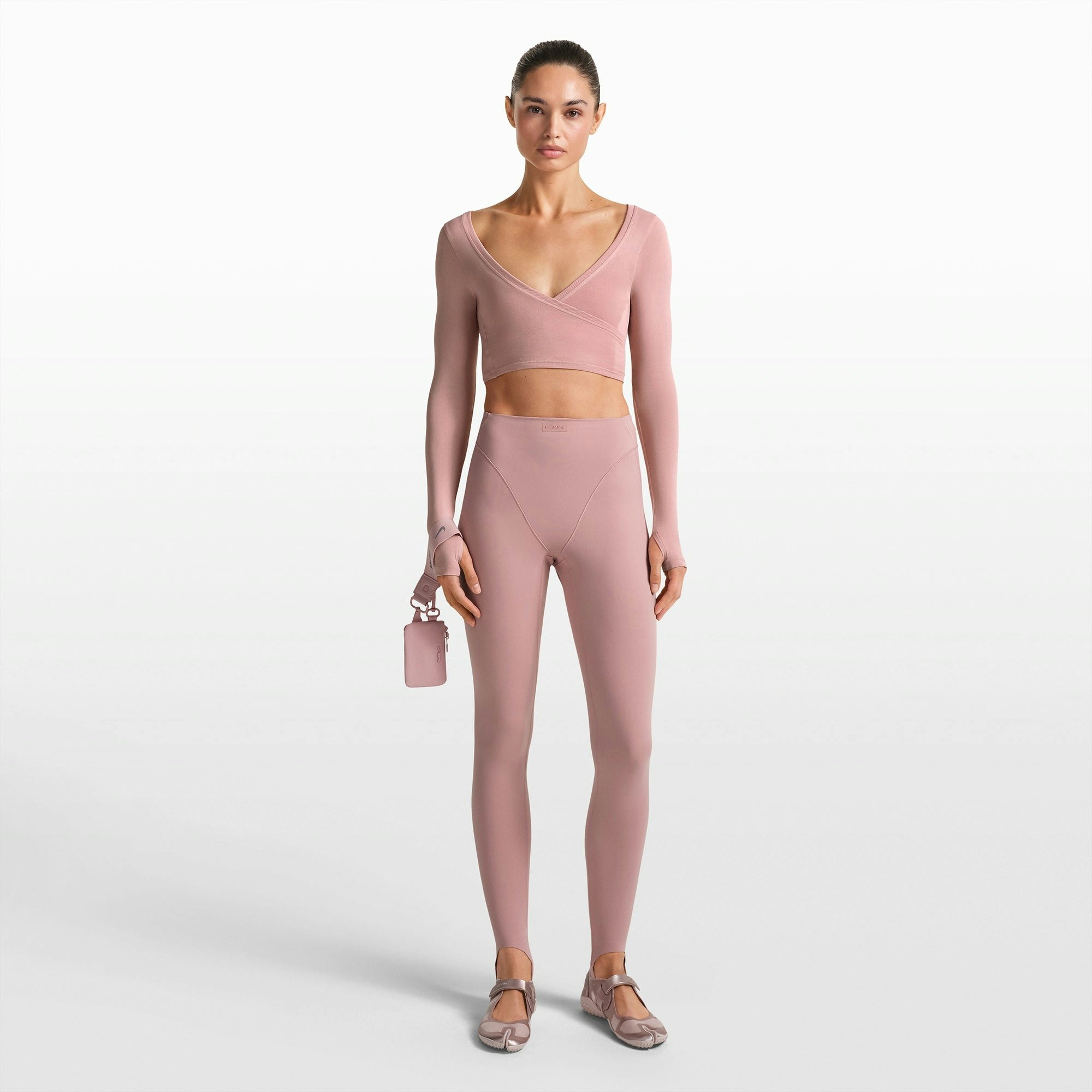 NikeSKIMS ACCESSORIES KEYCHAIN WRISTLET | HIMALAYAN FLAT ON A WHITE BACKGROUND