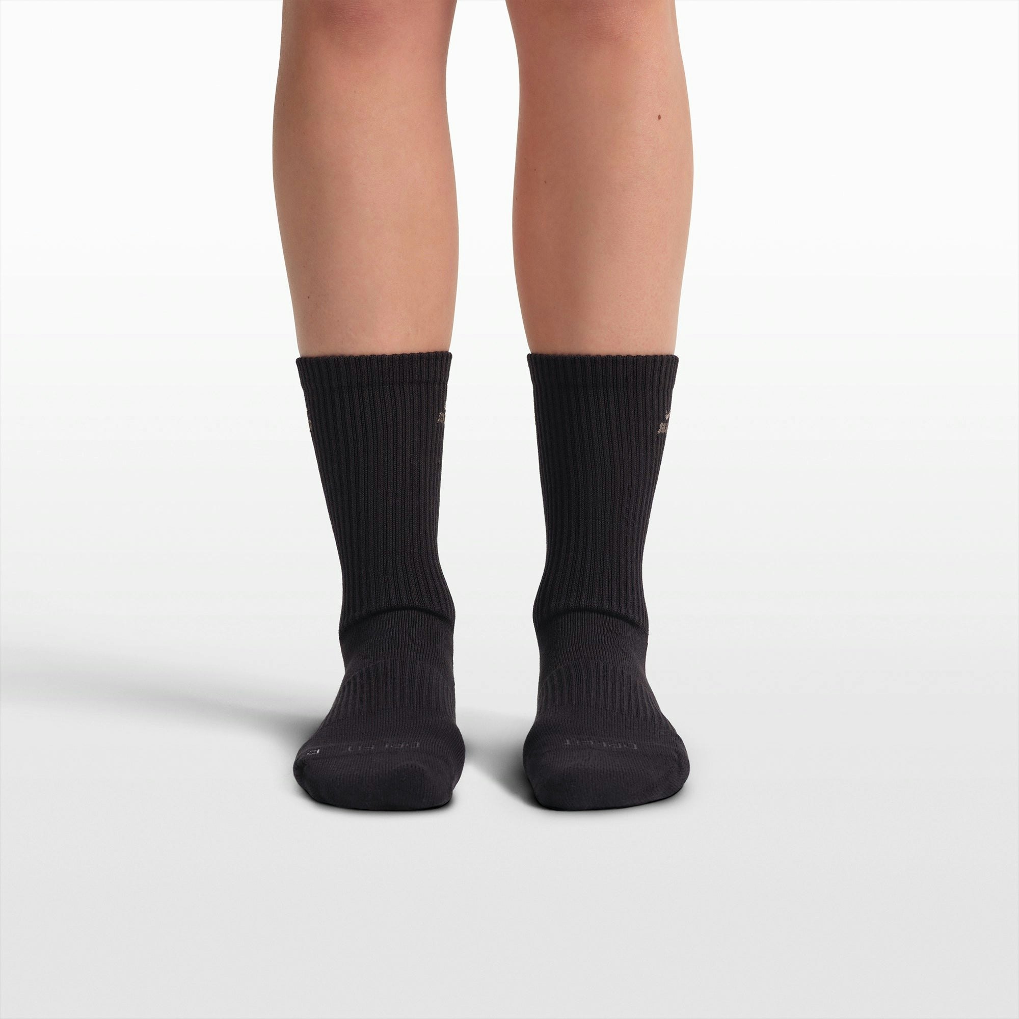 NikeSKIMS ACCESSORIES DRI-FIT PILATES GRIP CREW SOCK | OBSIDIAN FLAT ON A WHITE BACKGROUND