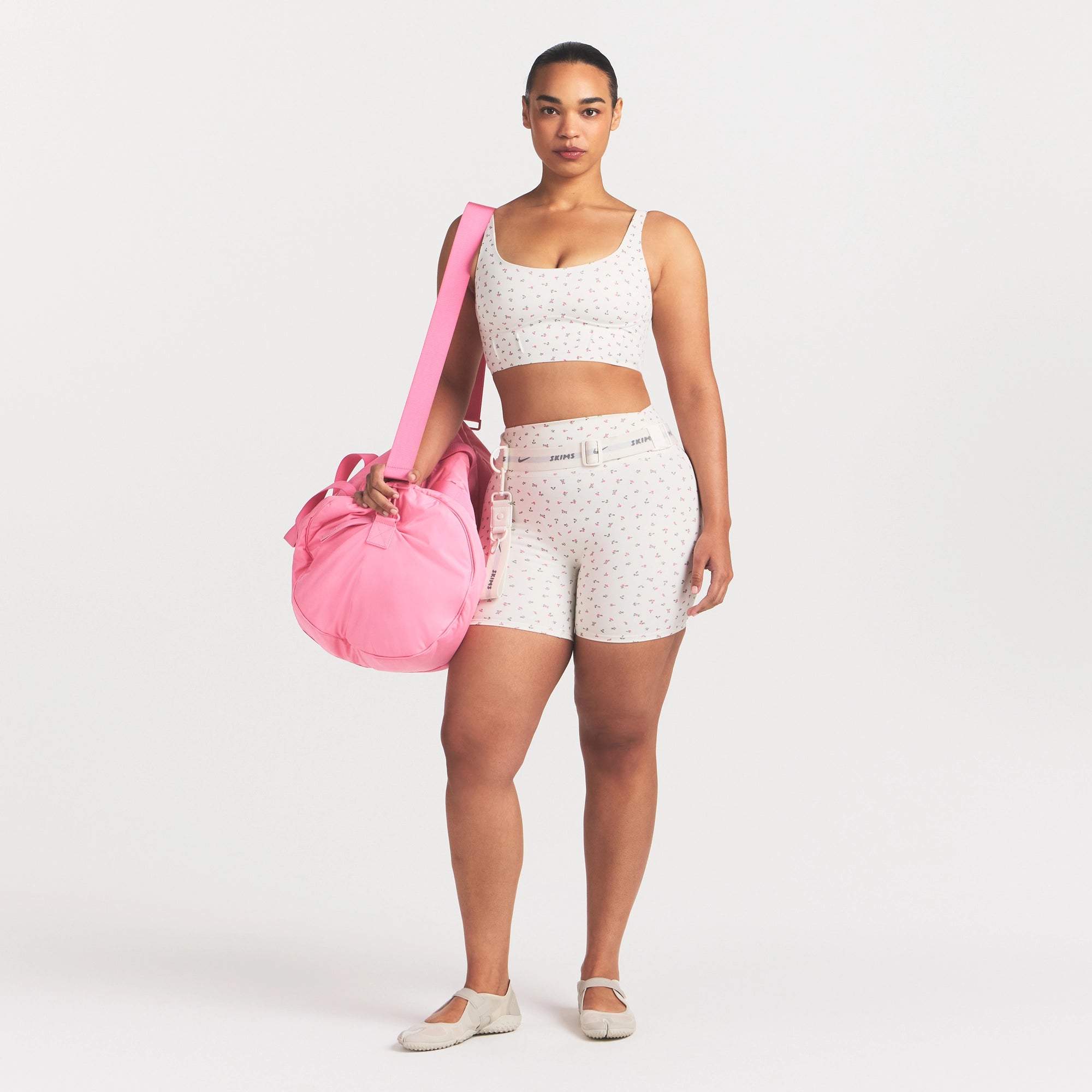 NikeSKIMS MATTE CORSET LONGLINE BRA | DITSY FLORAL PRINT ON A MODEL 