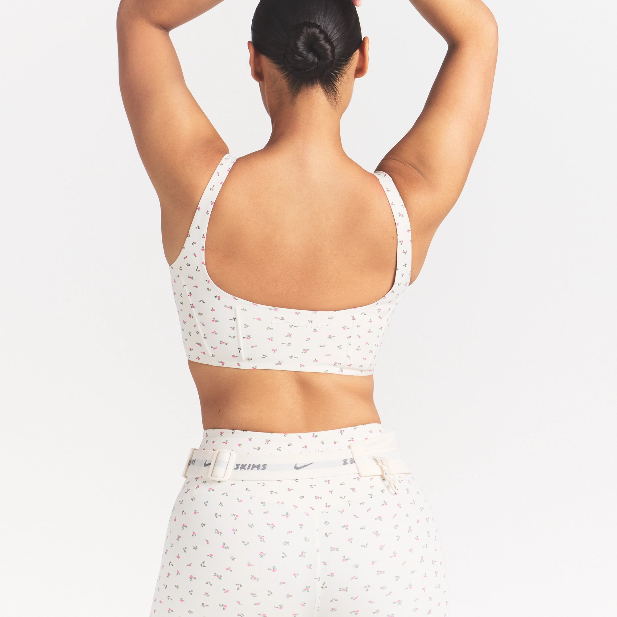 NikeSKIMS MATTE CORSET LONGLINE BRA | DITSY FLORAL PRINT ON A MODEL 