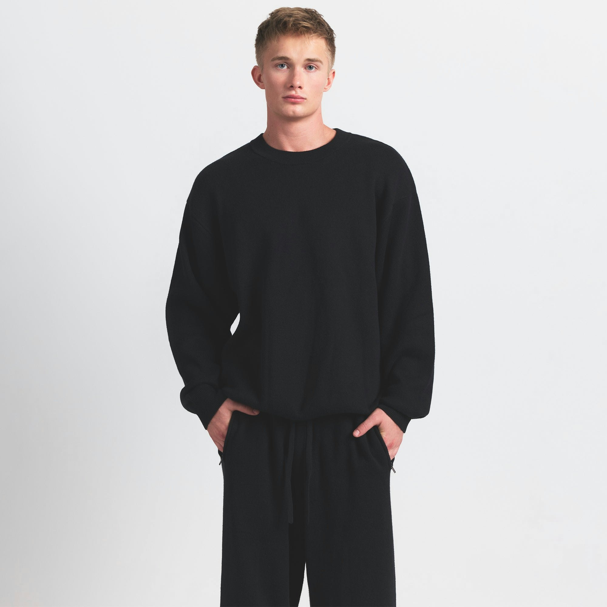 COTTON KNIT MENS STRAIGHT LEG PANT | OBSIDIAN ON A MODEL SIDE VIEW @ | FOCUS: 0.0, 1.0, 0.9