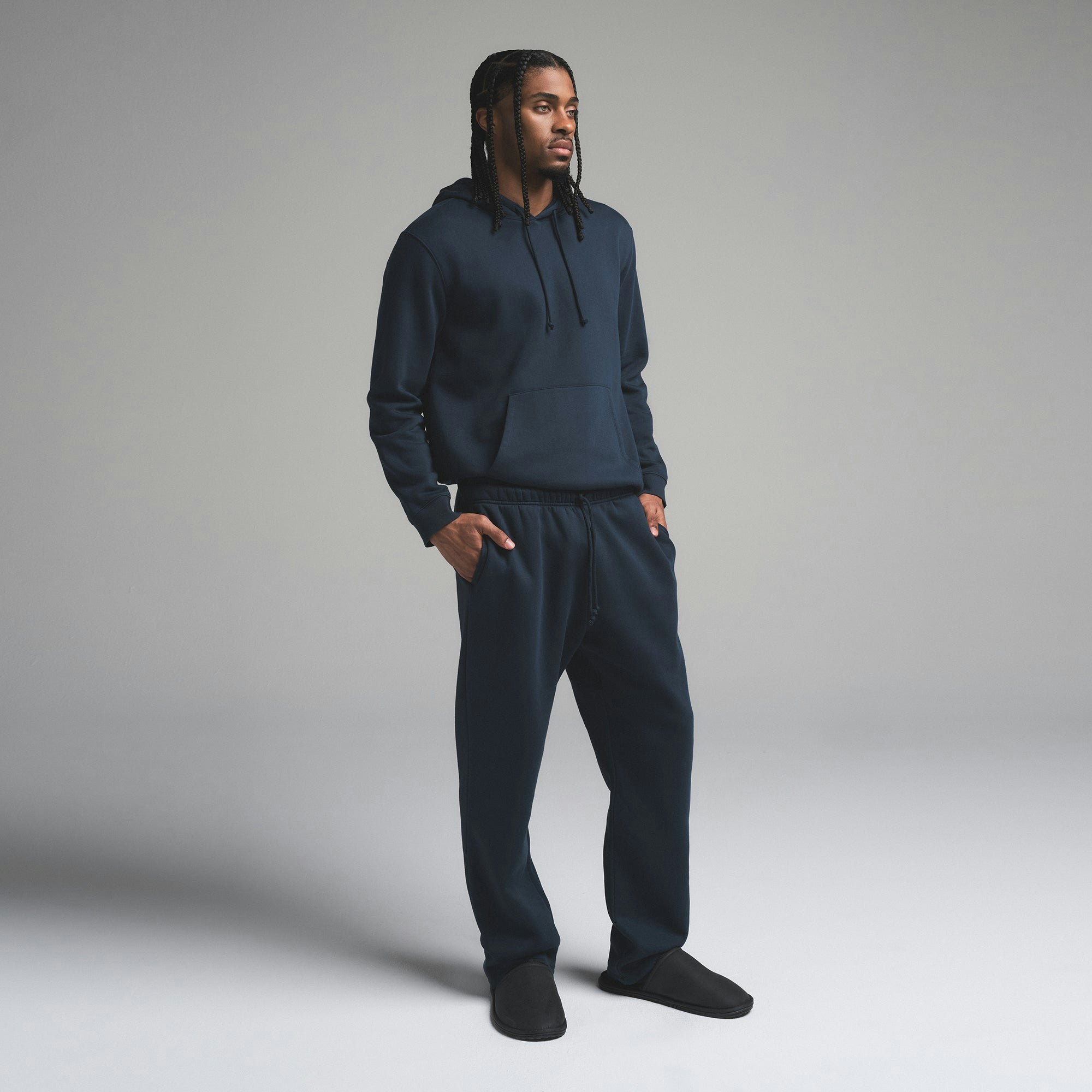 FLEECE LOUNGE MENS CLASSIC STRAIGHT LEG PANT | NAVY ON A MODEL SIDE VIEW | FOCUS: 0.0, 1.0, 0.9