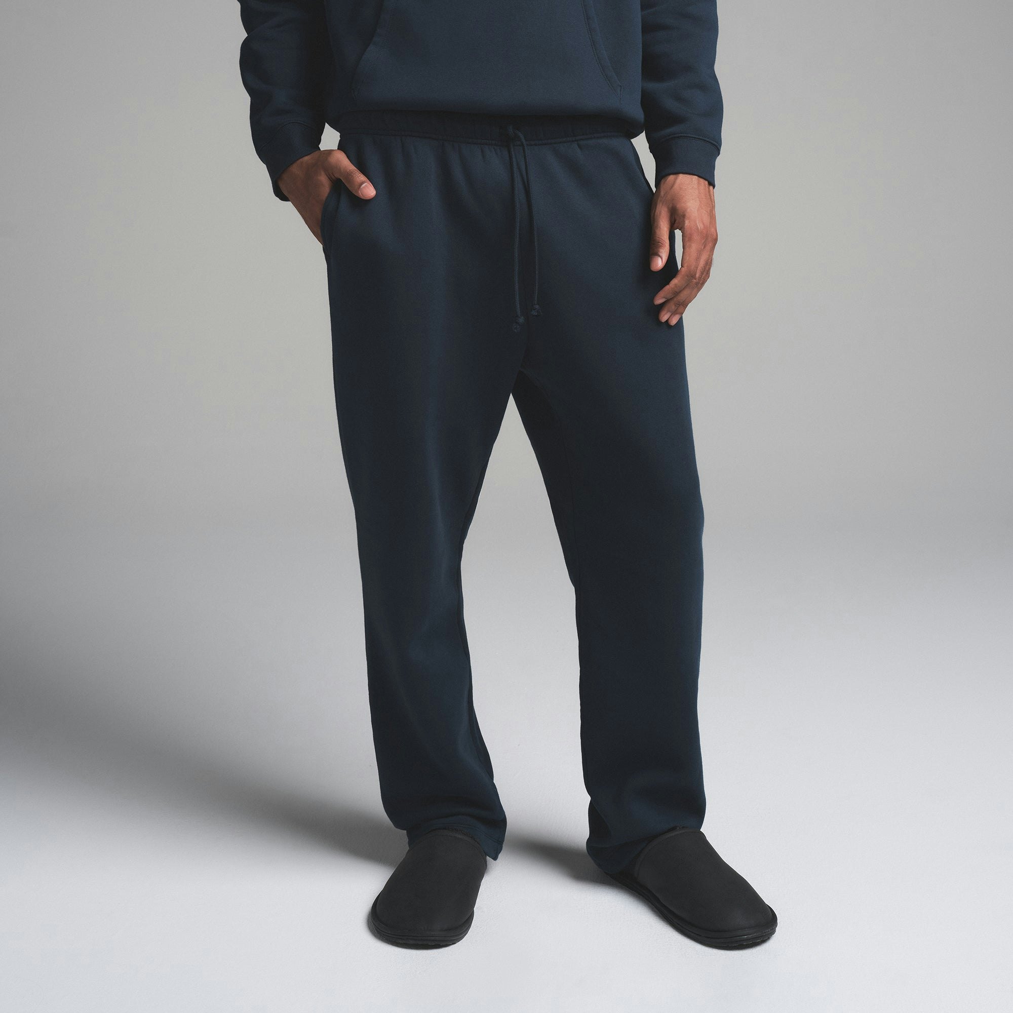 FLEECE LOUNGE MENS CLASSIC STRAIGHT LEG PANT | NAVY ON A MODEL SIDE VIEW | FOCUS: 0.0, 1.0, 0.9
