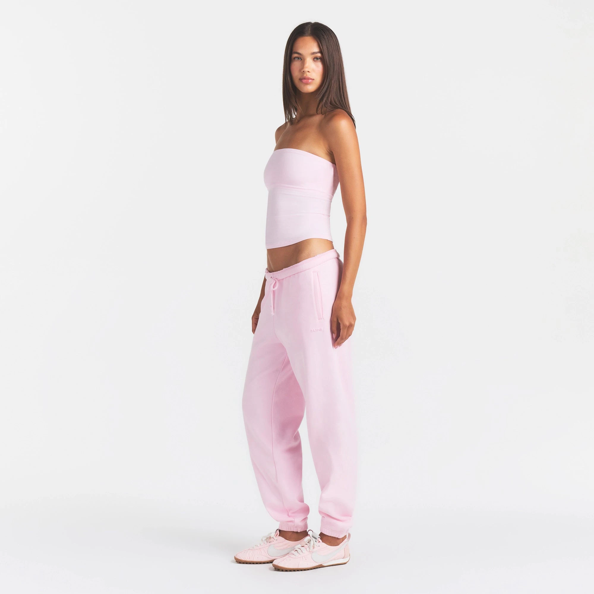 COTTON FLEECE CLASSIC JOGGER | CHERRY BLOSSOM ON A MODEL FRONT VIEW @ | FOCUS: 0.0, 1.0, 0.9