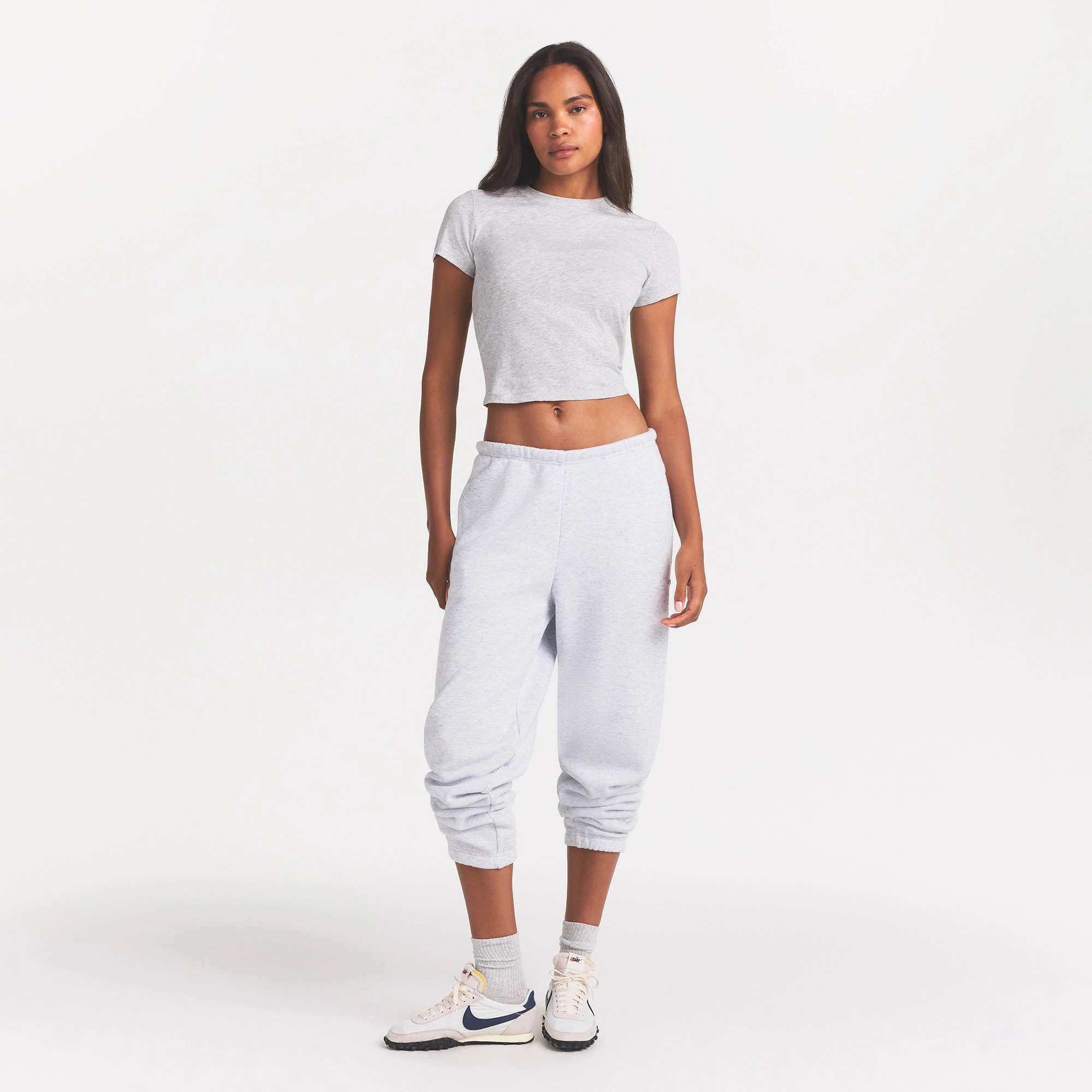 COTTON FLEECE CLASSIC JOGGER | LIGHT HEATHER GREY ON A MODEL FRONT VIEW @ | FOCUS: 0.0, 1.0, 0.9