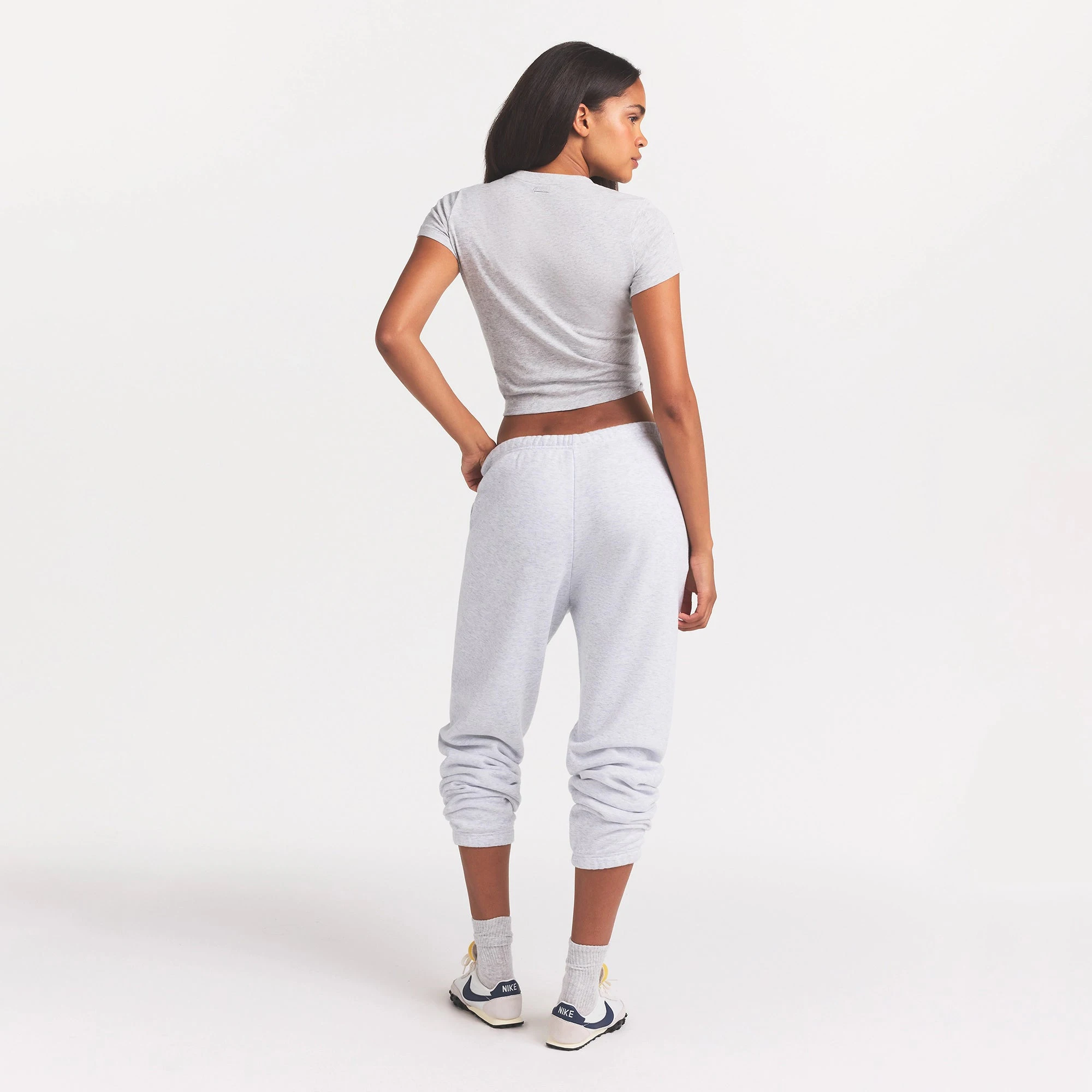 COTTON FLEECE CLASSIC JOGGER | LIGHT HEATHER GREY ON A MODEL BACK VIEW @ | FOCUS: 0.0, 1.0, 0.9