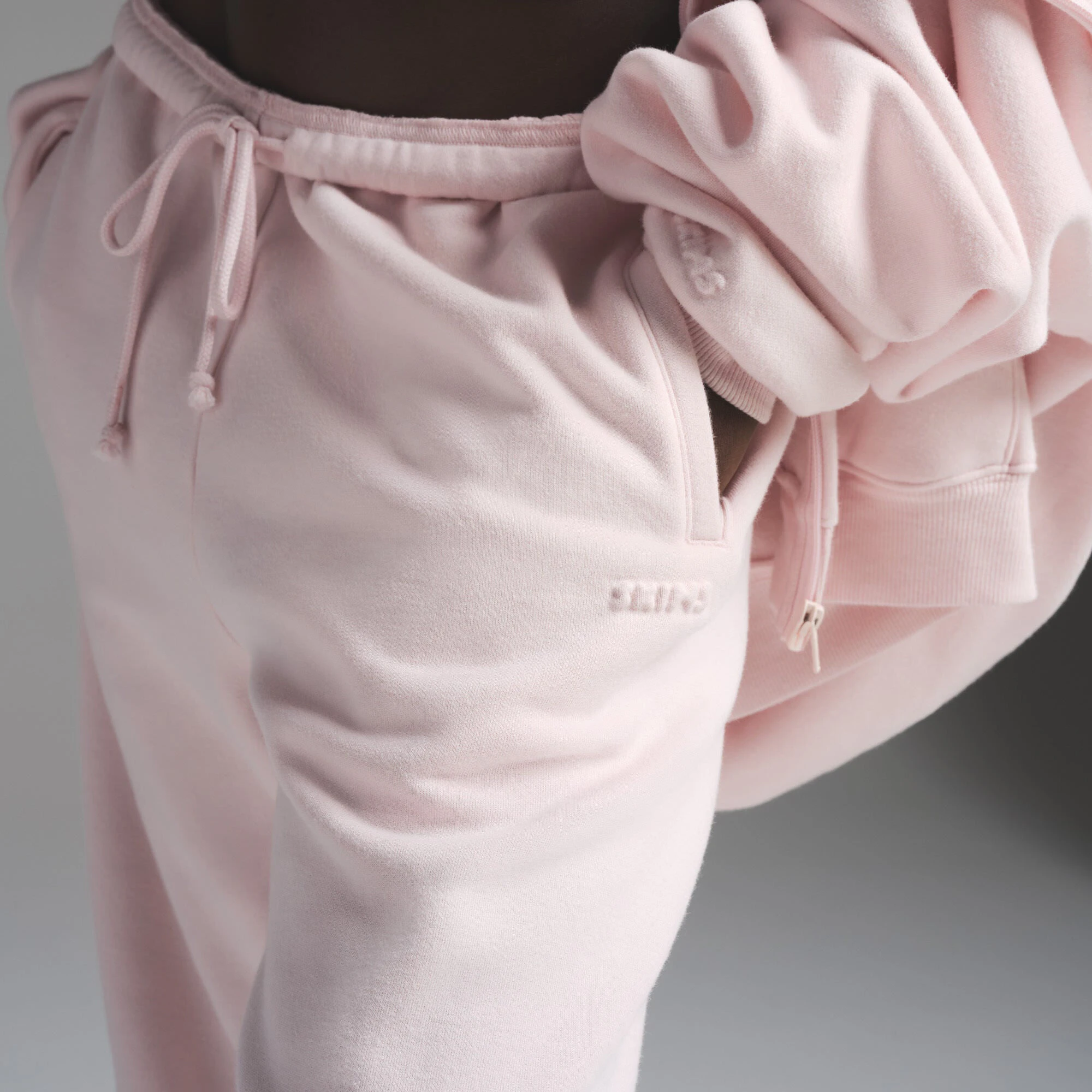 COTTON FLEECE CLASSIC JOGGER | BARELY PINK ON A MODEL FRONT VIEW | FOCUS: 0.0, 1.0, 0.9
