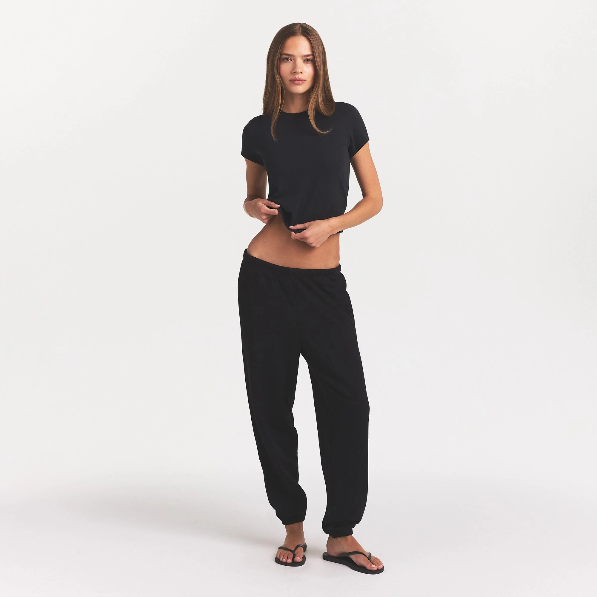 COTTON FLEECE CLASSIC JOGGER | ONYX ON A MODEL FRONT VIEW @ | FOCUS: 0.0, 1.0, 0.9