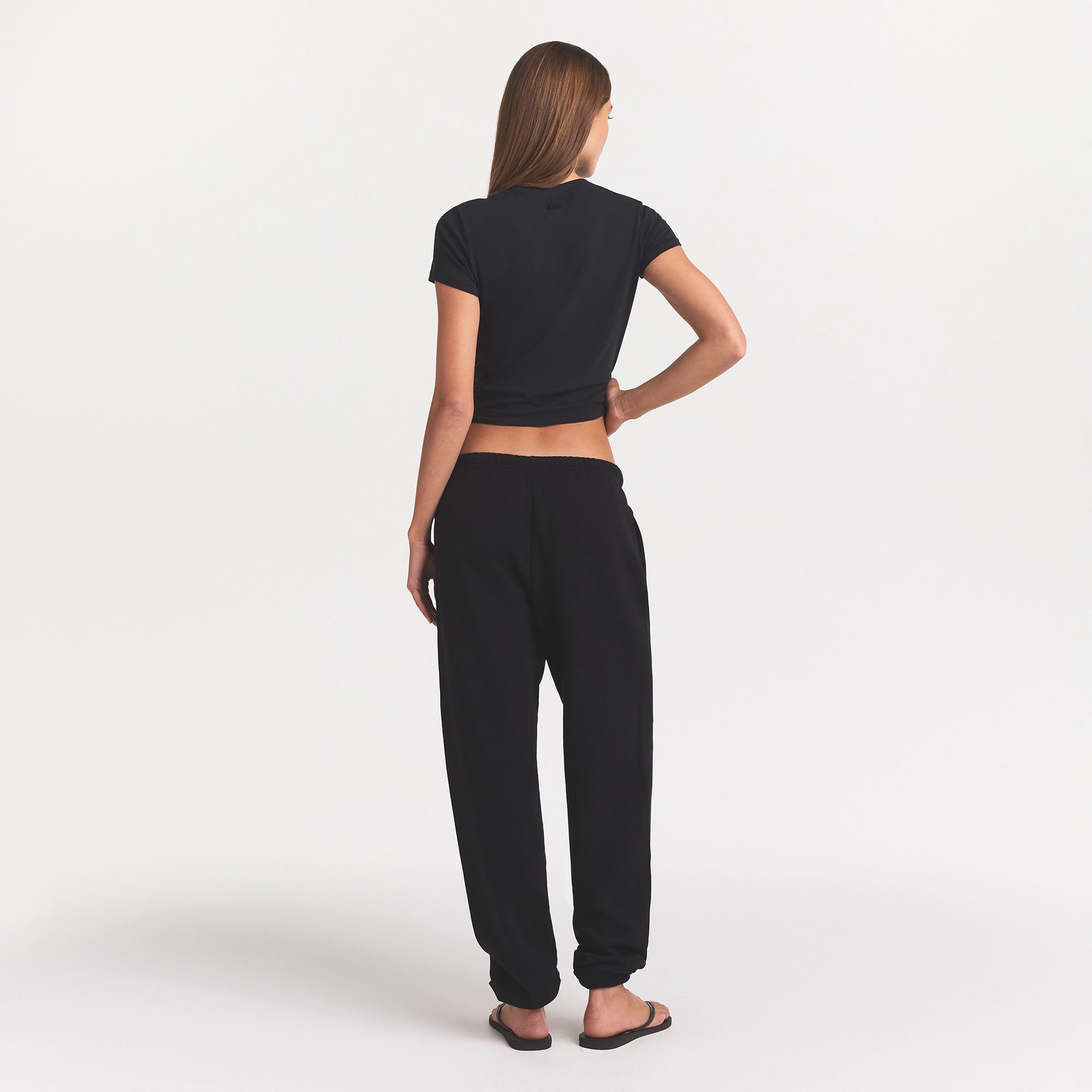 COTTON FLEECE CLASSIC JOGGER | ONYX ON A MODEL BACK VIEW @ | FOCUS: 0.0, 1.0, 0.9