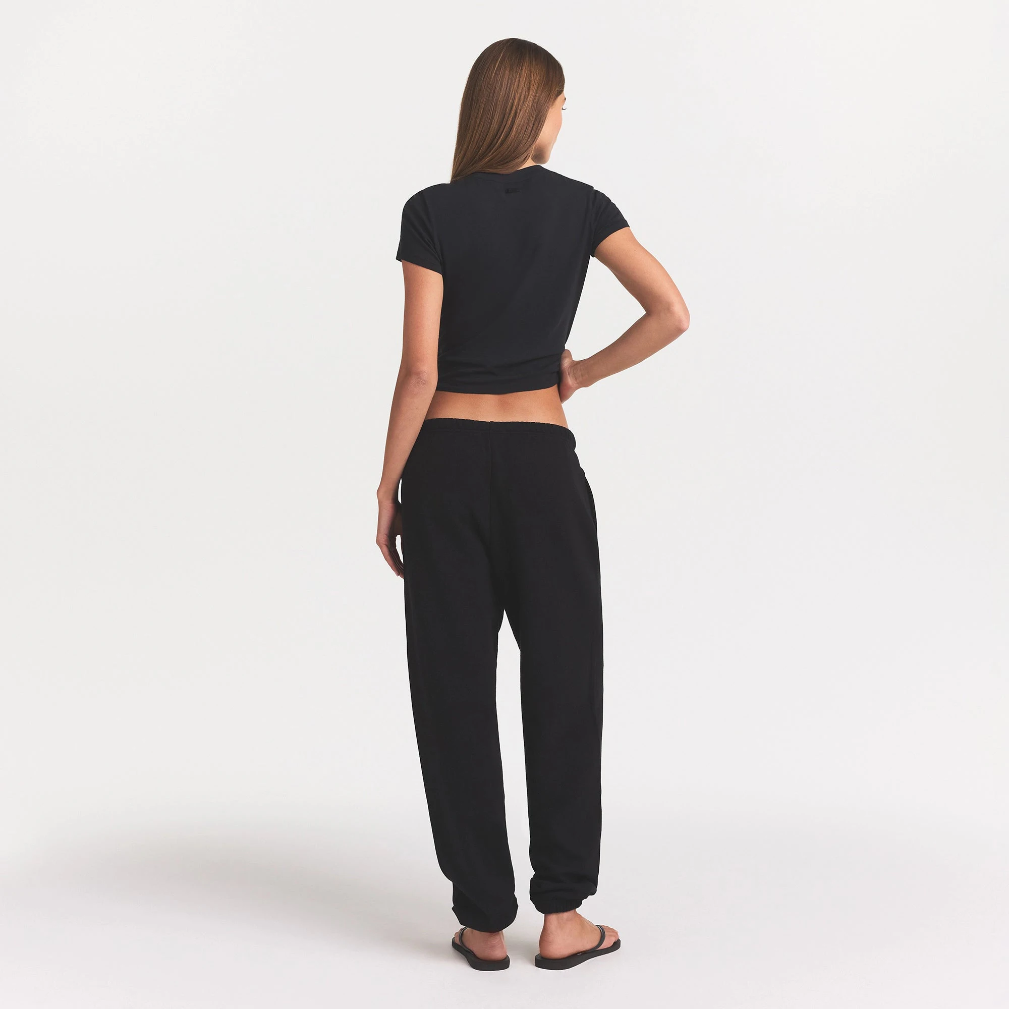 COTTON FLEECE CLASSIC JOGGER | ONYX ON A MODEL BACK VIEW @ | FOCUS: 0.0, 1.0, 0.9