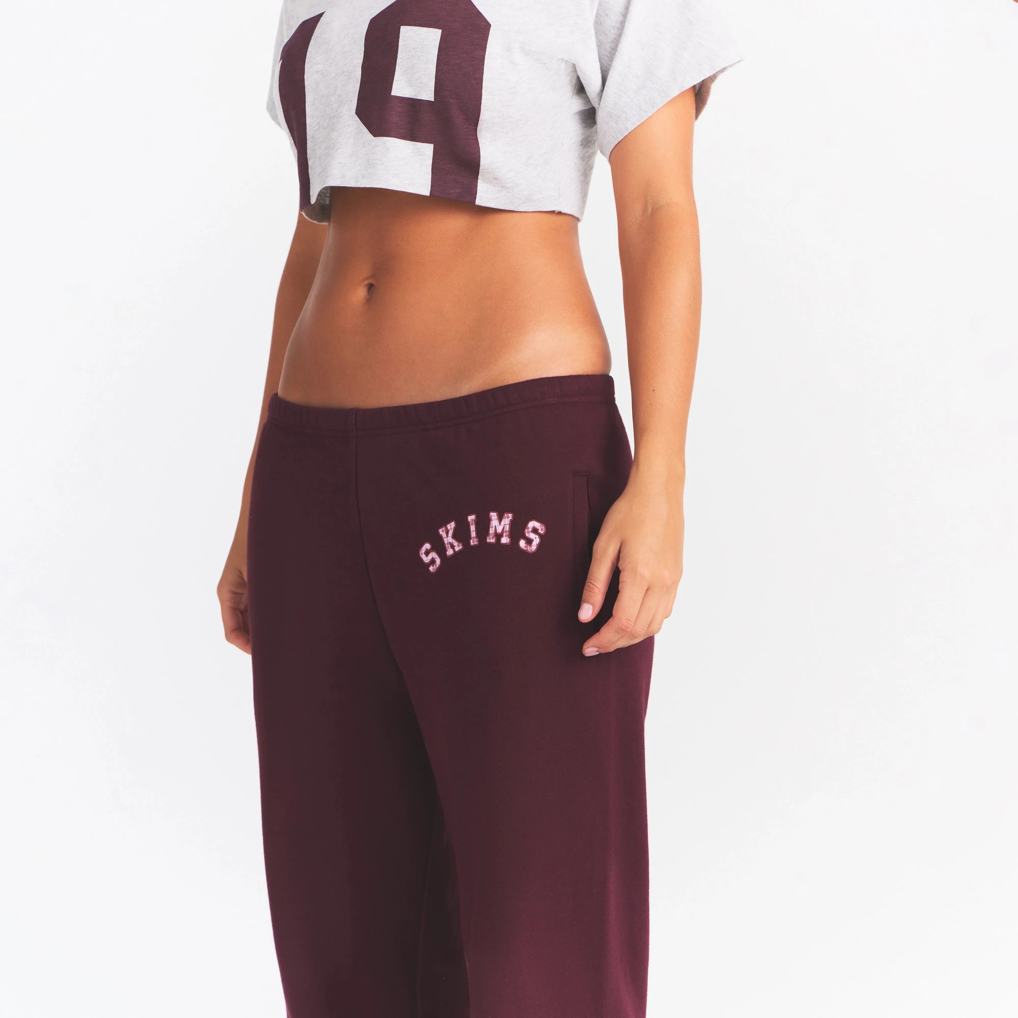 COTTON FLEECE CLASSIC JOGGER | CURRANT ARCHED SKIMS PLAID ON A MODEL SIDE VIEW @ | FOCUS: 0.0, 1.0, 0.9