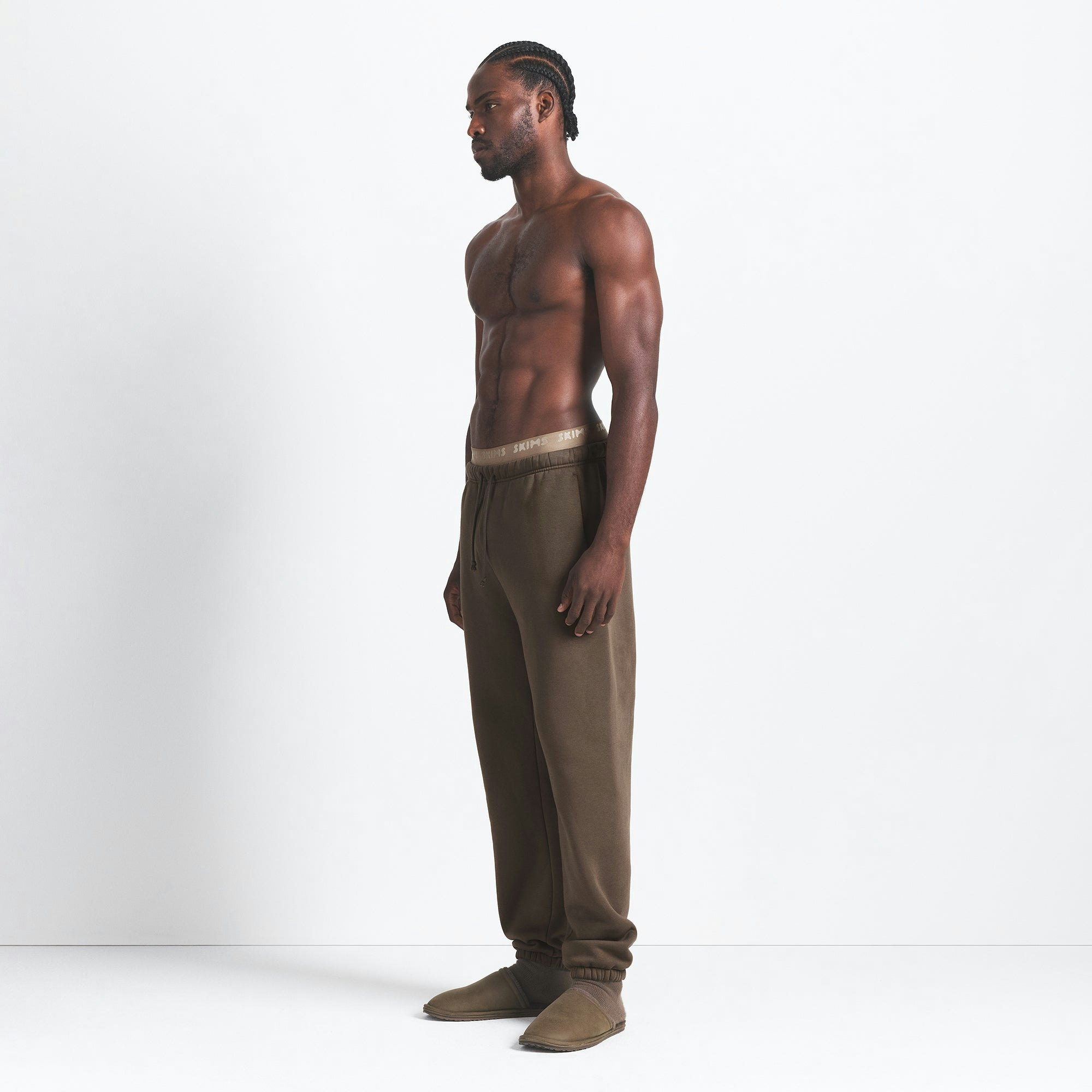 FLEECE LOUNGE MENS RELAXED JOGGER | DRIFTWOOD ON A MODEL SIDE VIEW @ | FOCUS: 0.0, 1.0, 0.9