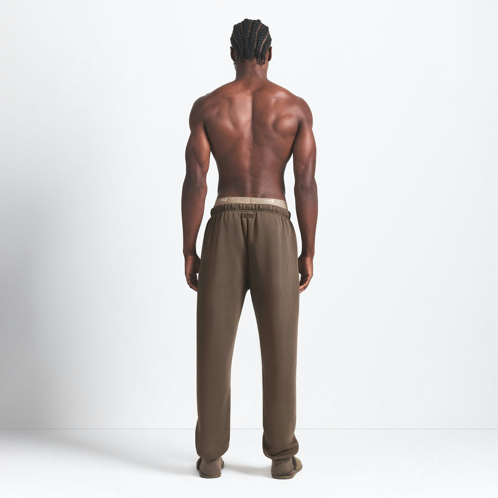 FLEECE LOUNGE MENS RELAXED JOGGER | DRIFTWOOD ON A MODEL BACK VIEW @ | FOCUS: 0.0, 1.0, 0.9
