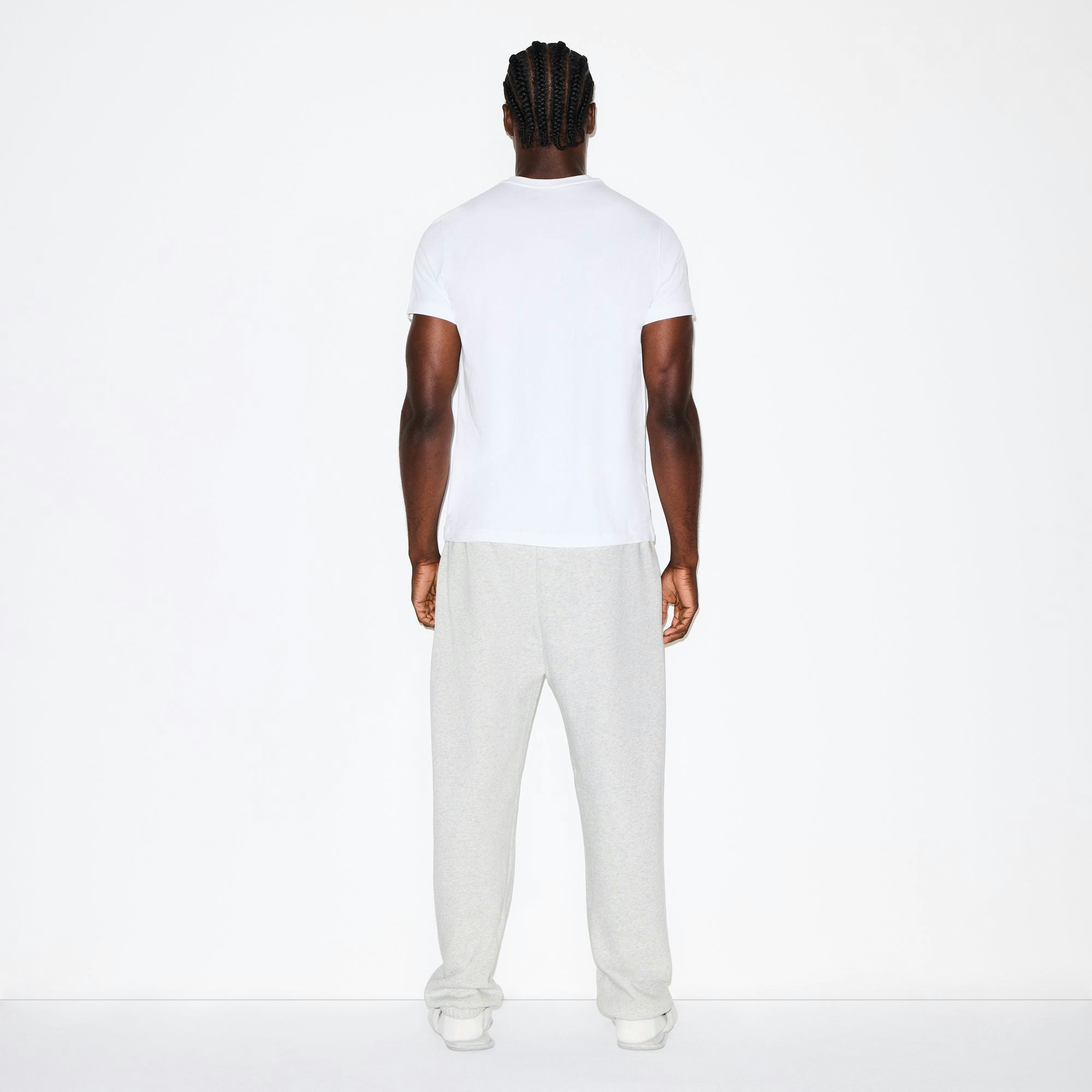 FLEECE LOUNGE MENS RELAXED JOGGER | LIGHT HEATHER GREY ON A MODEL FRONT VIEW @ | FOCUS: 0.0, 1.0, 0.9