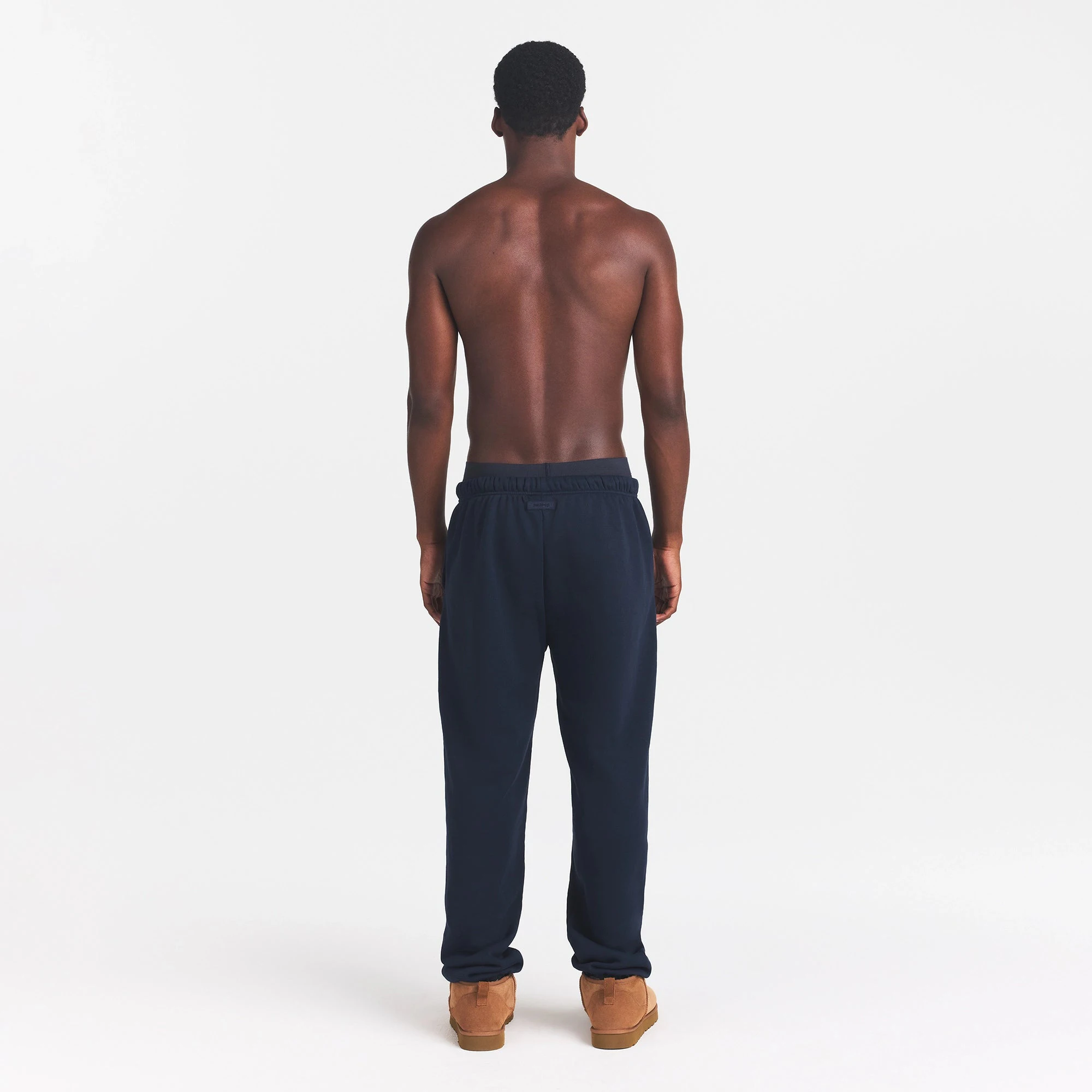 FLEECE LOUNGE MENS RELAXED JOGGER | NAVY ON A MODEL BACK VIEW | FOCUS: 0.0, 1.0, 0.9