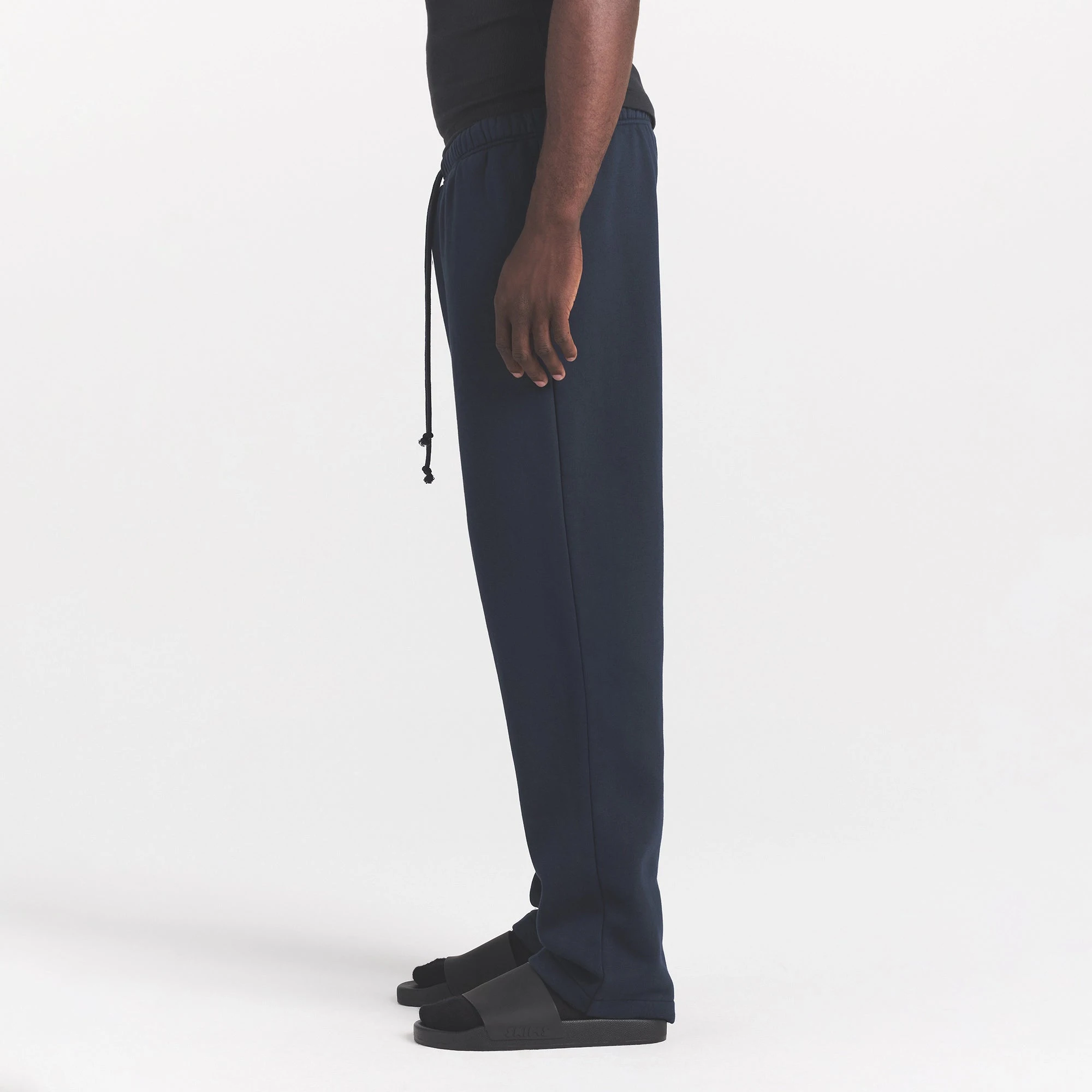 FLEECE LOUNGE MENS CLASSIC STRAIGHT LEG PANT | NAVY ON A MODEL SIDE VIEW @ | FOCUS: 0.0, 1.0, 0.9