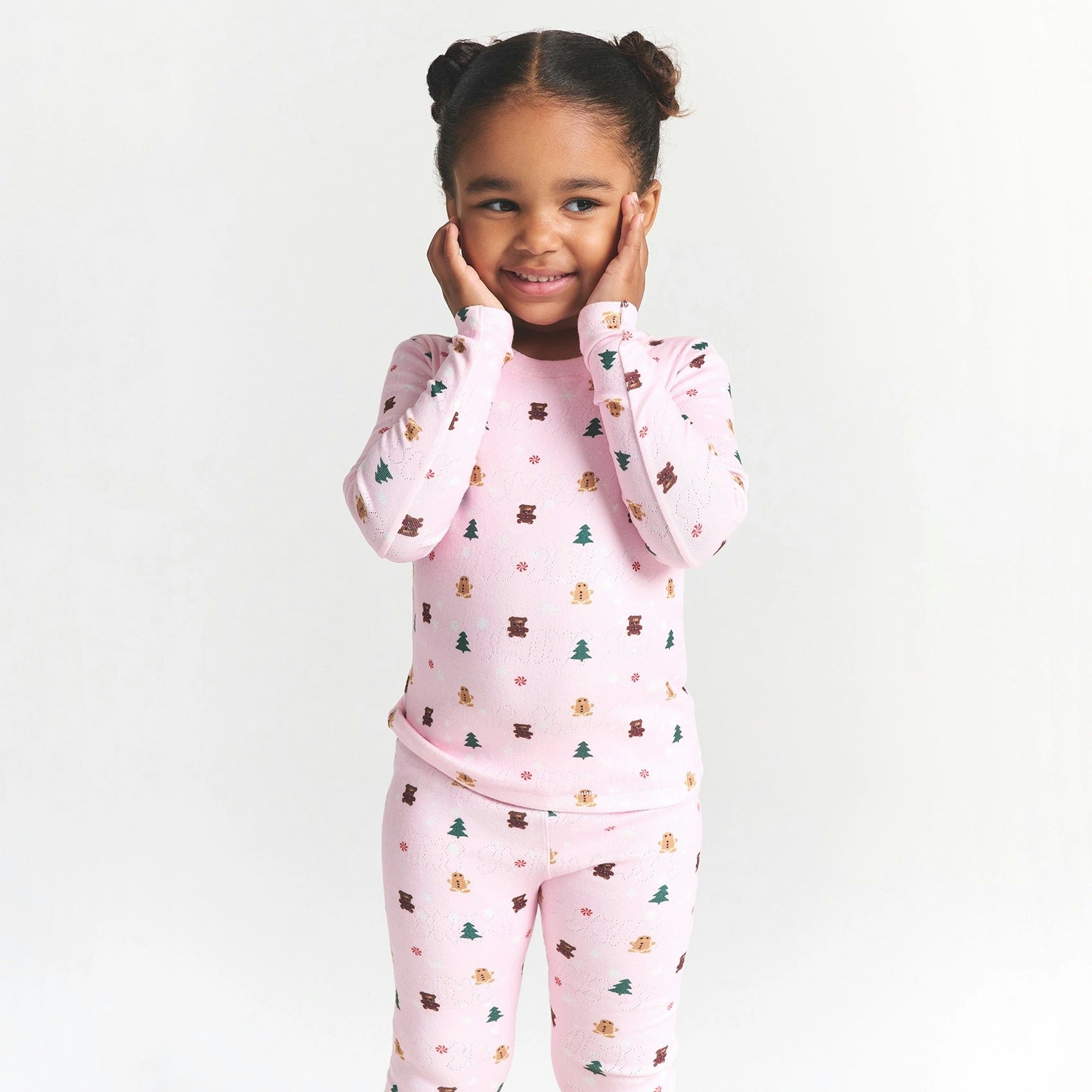 CACTUS PLANT FLEA MARKET X SKIMS PLUSH POINTELLE KIDS LONG SLEEVE SET | CHERRY BLOSSOM SNOW PRINT ON A MODEL FRONT VIEW @ | FOCUS: 0.0, 1.0, 0.9