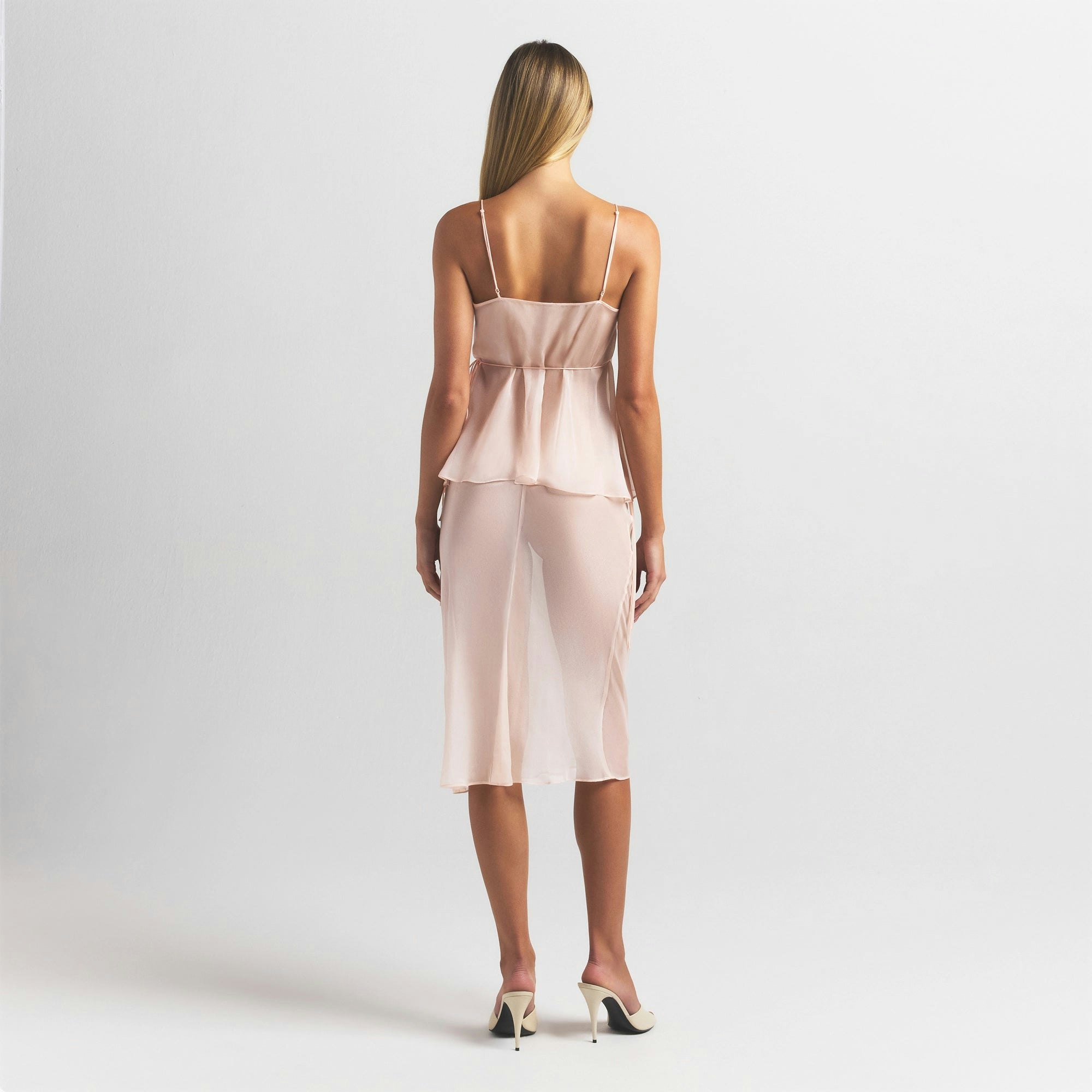 SKIMS ROMANCE MIDI SKIRT | PRIMROSE ON A MODEL FRONT VIEW @ | FOCUS: 0.0, 1.0, 0.9