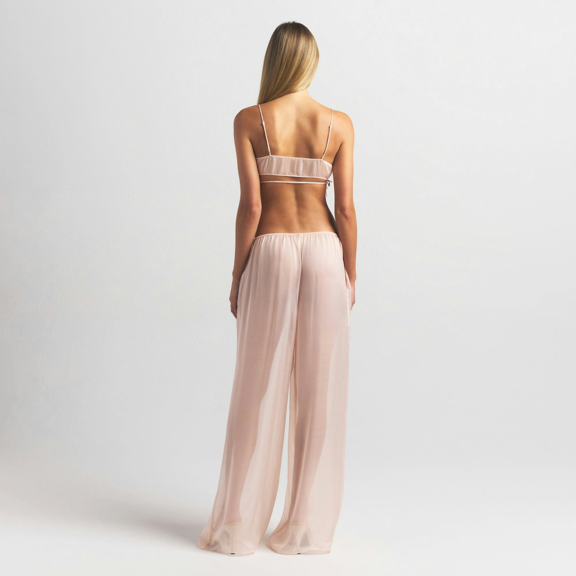 SKIMS ROMANCE WIDE LEG PANT | PRIMROSE ON A MODEL FRONT VIEW @ | FOCUS: 0.0, 1.0, 0.9