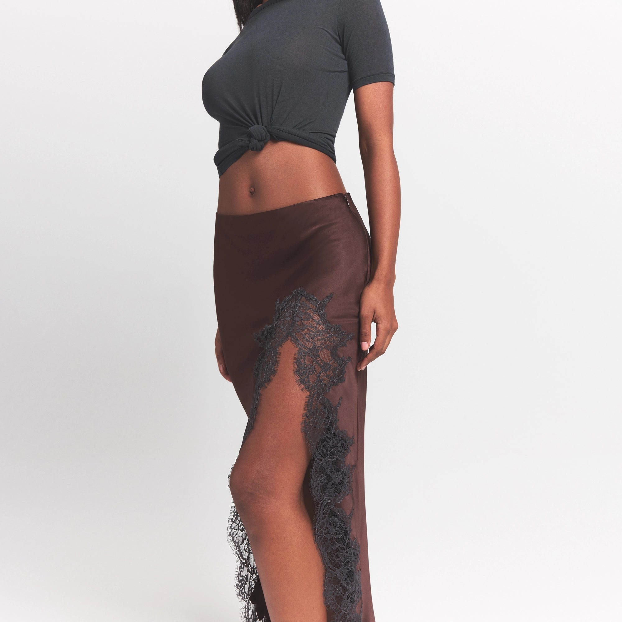SILK LACE SKIRT | ESPRESSO CONTRAST ON A MODEL SIDE VIEW @ | FOCUS: 0.0, 1.0, 0.9