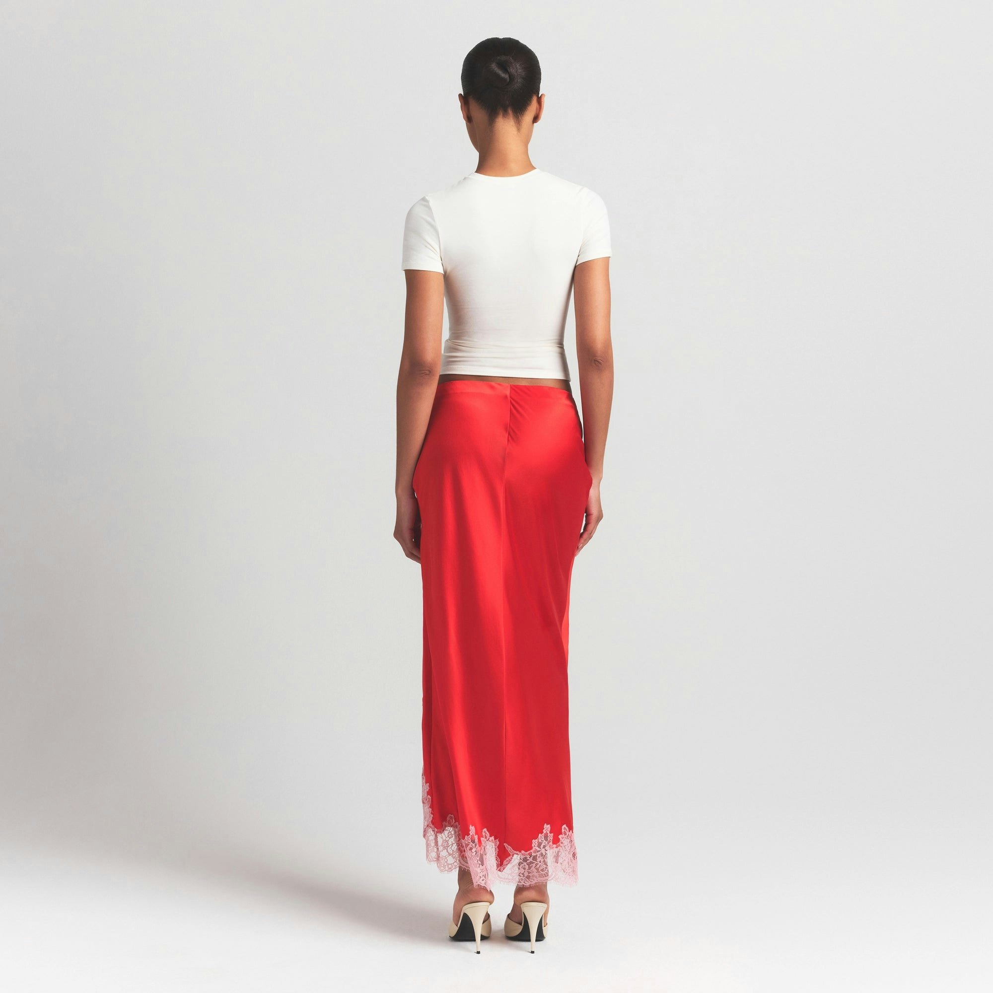 SILK LACE SKIRT | RUBY CONTRAST ON A MODEL FRONT VIEW @ | FOCUS: 0.0, 1.0, 0.9