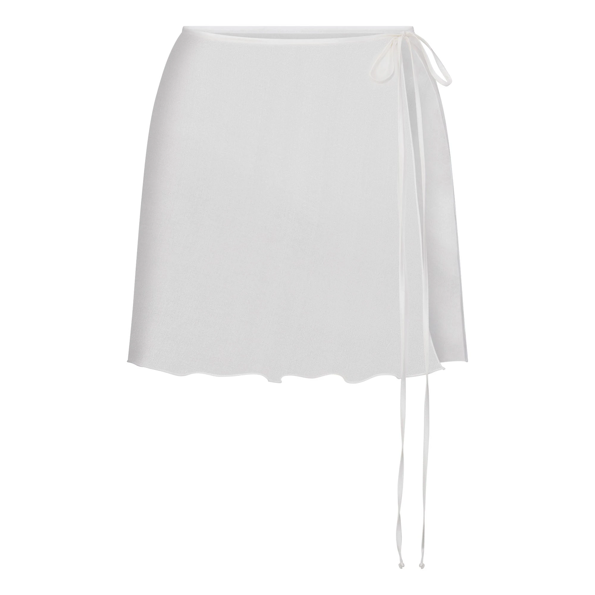 SKIMS ROMANCE TIE SIDE MINI SKIRT | IVORY LAYS FLAT ON A WHITE BACKGROUND | FLT 