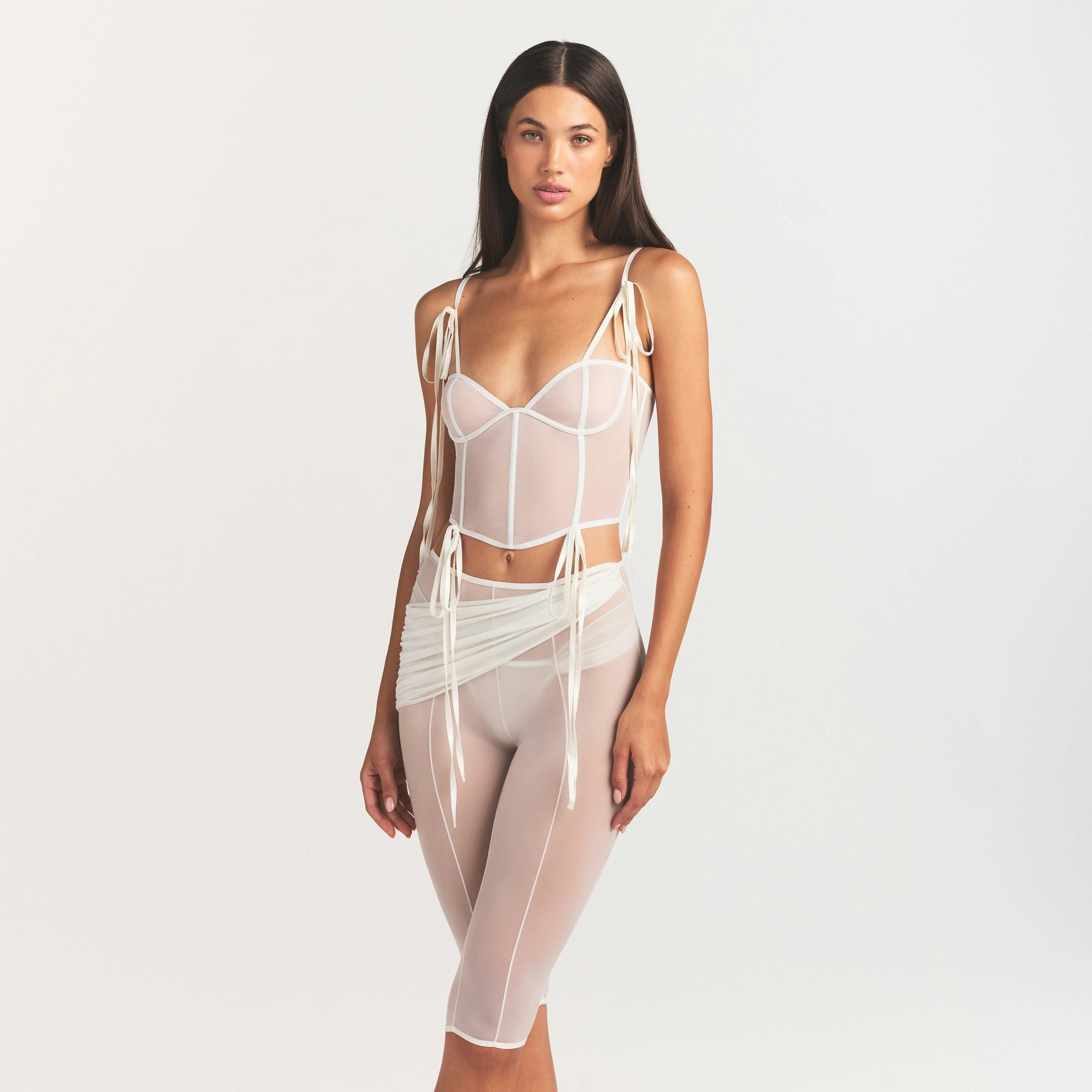 ULTRA FINE MESH DRAPED CAPRI | IVORY ON A MODEL SIDE VIEW @ | FOCUS: 0.0, 1.0, 0.9