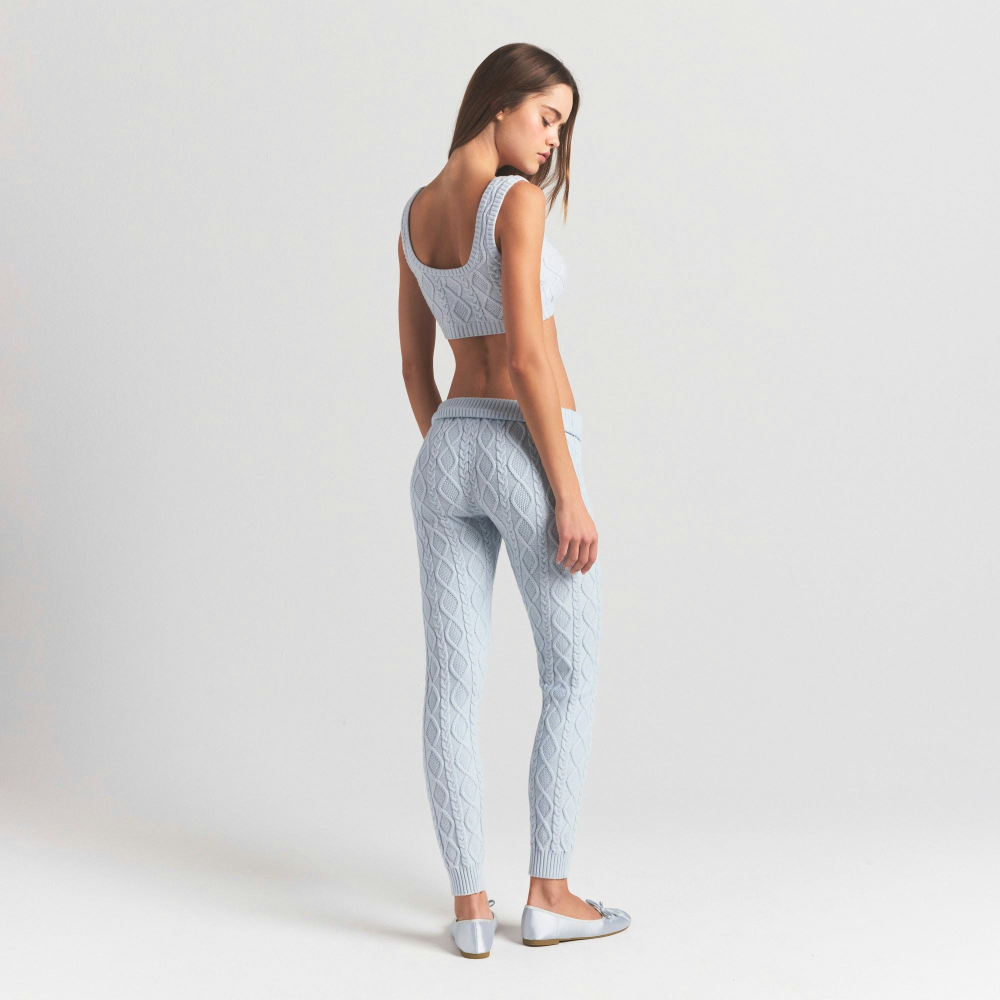 SWEATER KNITS CABLE LEGGING | ZEN BLUE ON A MODEL SIDE VIEW @ | FOCUS: 0.0, 1.0, 0.9