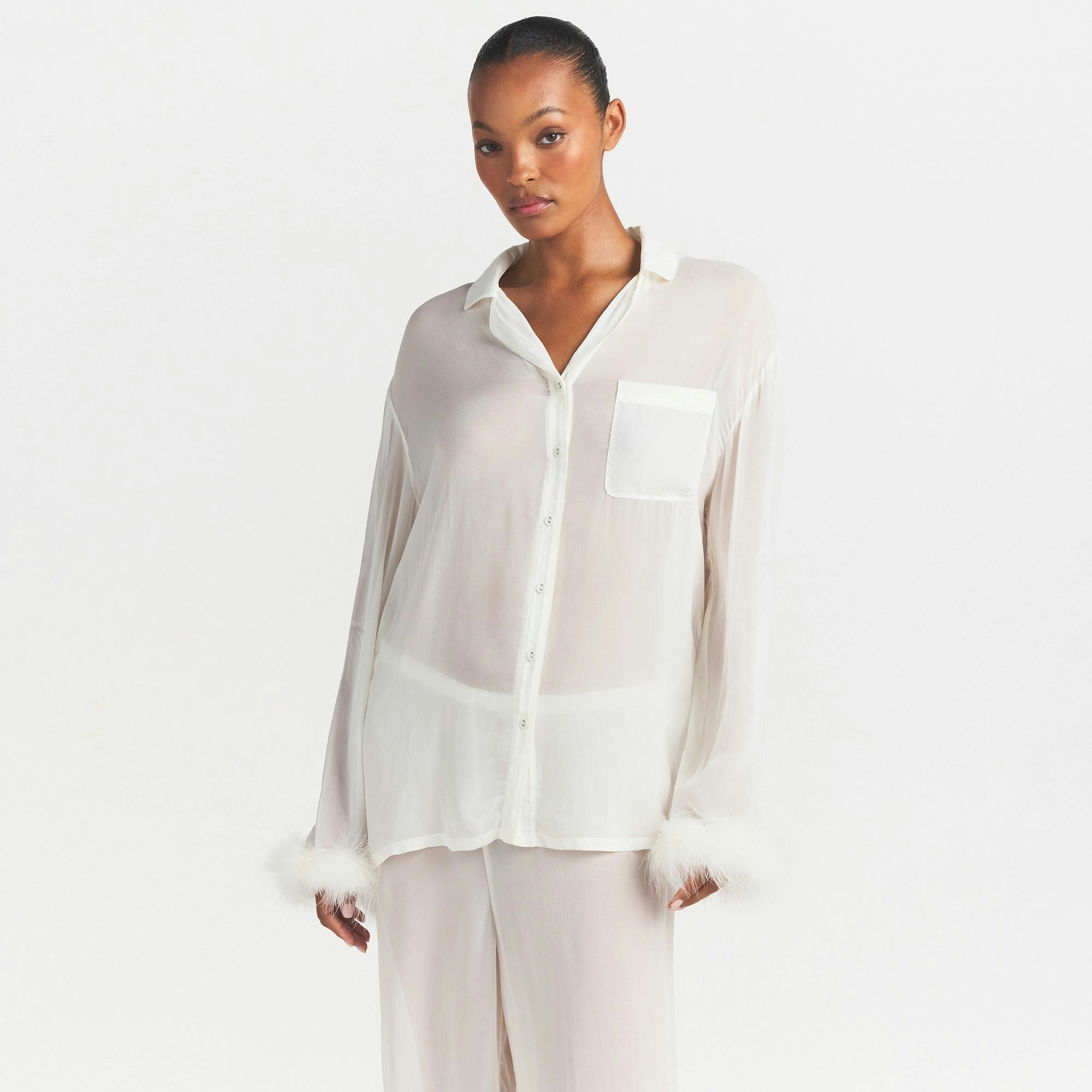 BRIDAL SLEEP FEATHER TRIM LONG SET | IVORY ON A MODEL SIDE VIEW @ | FOCUS: 0.0, 1.0, 0.9