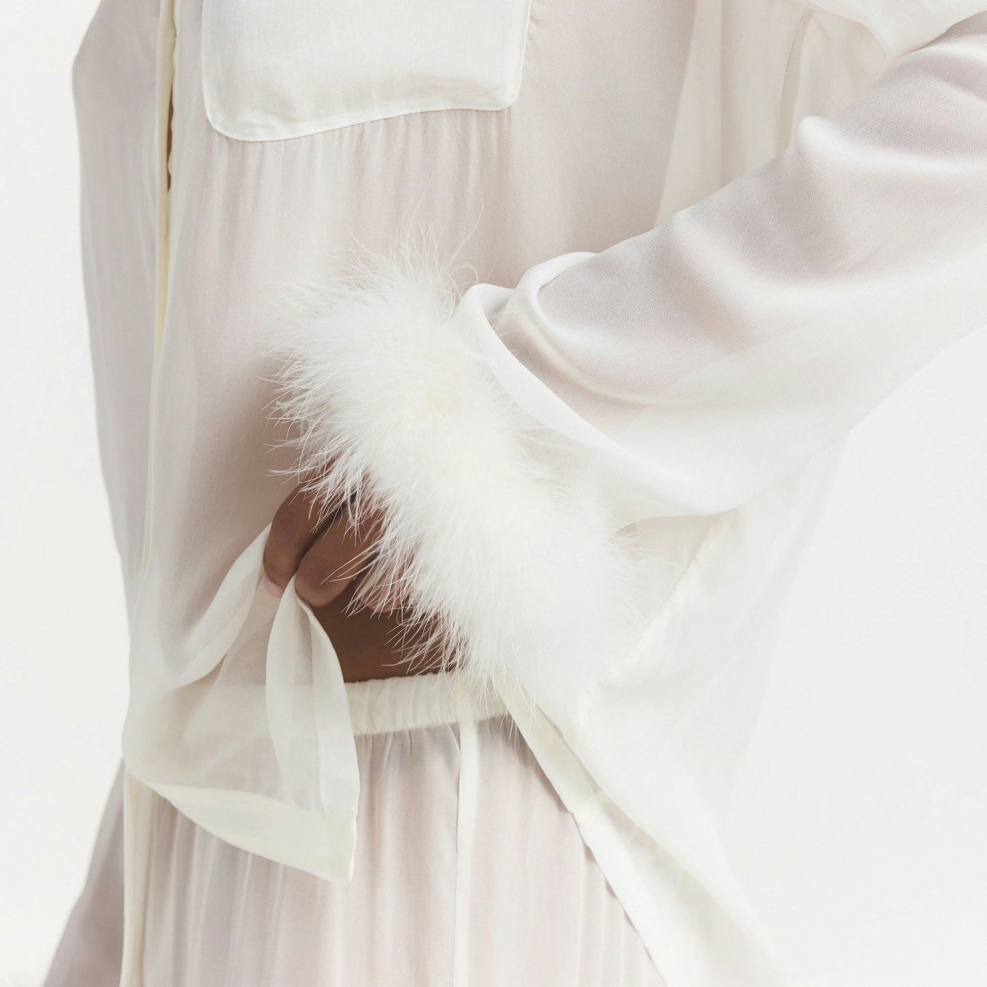 BRIDAL SLEEP FEATHER TRIM LONG SET | IVORY ON A MODEL SIDE VIEW @ | FOCUS: 0.0, 1.0, 0.9