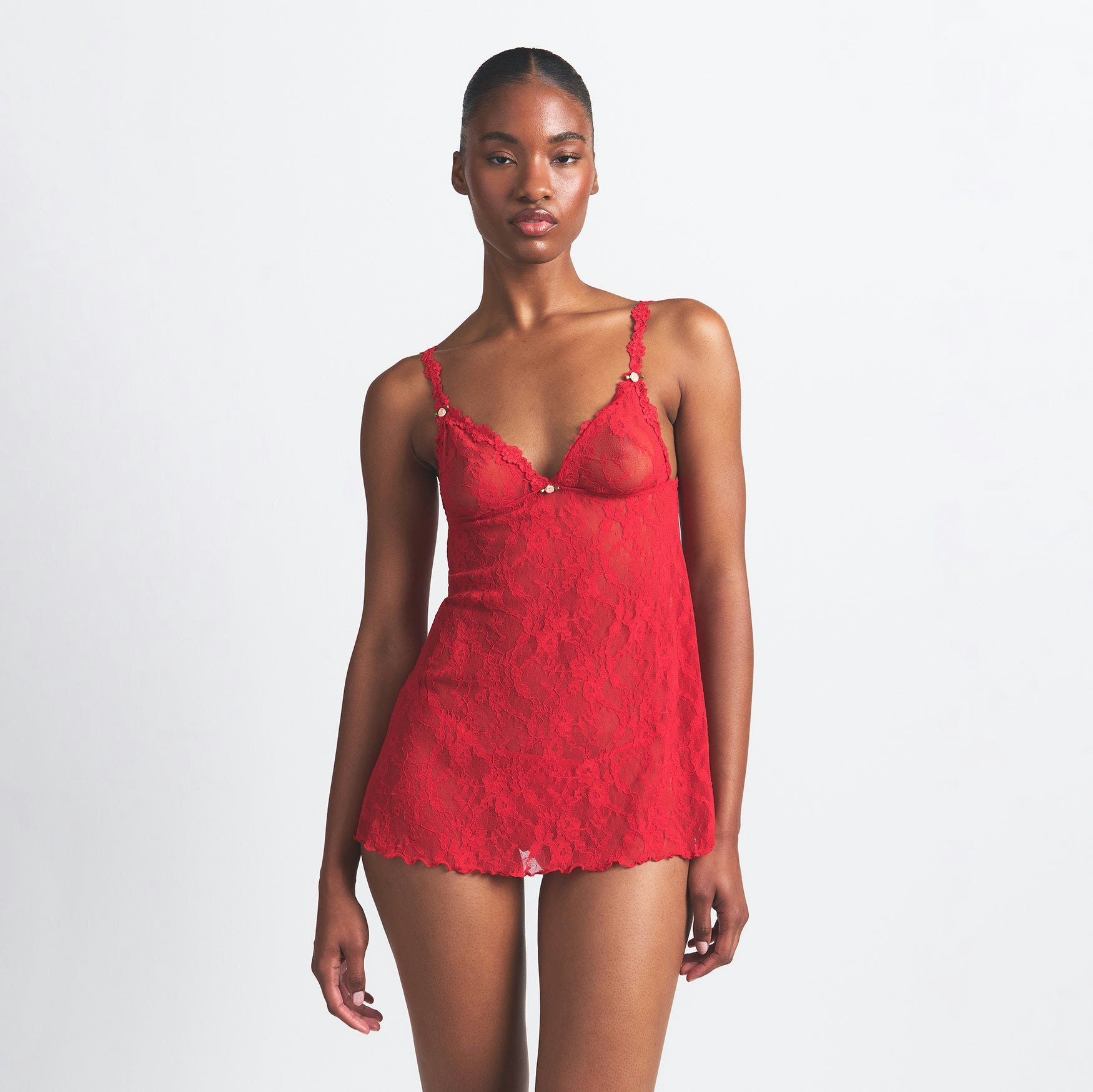STRETCH LACE SLIP AND THONG SET | RED ON A MODEL FRONT VIEW @ | FOCUS: 0.0, 1.0, 0.9