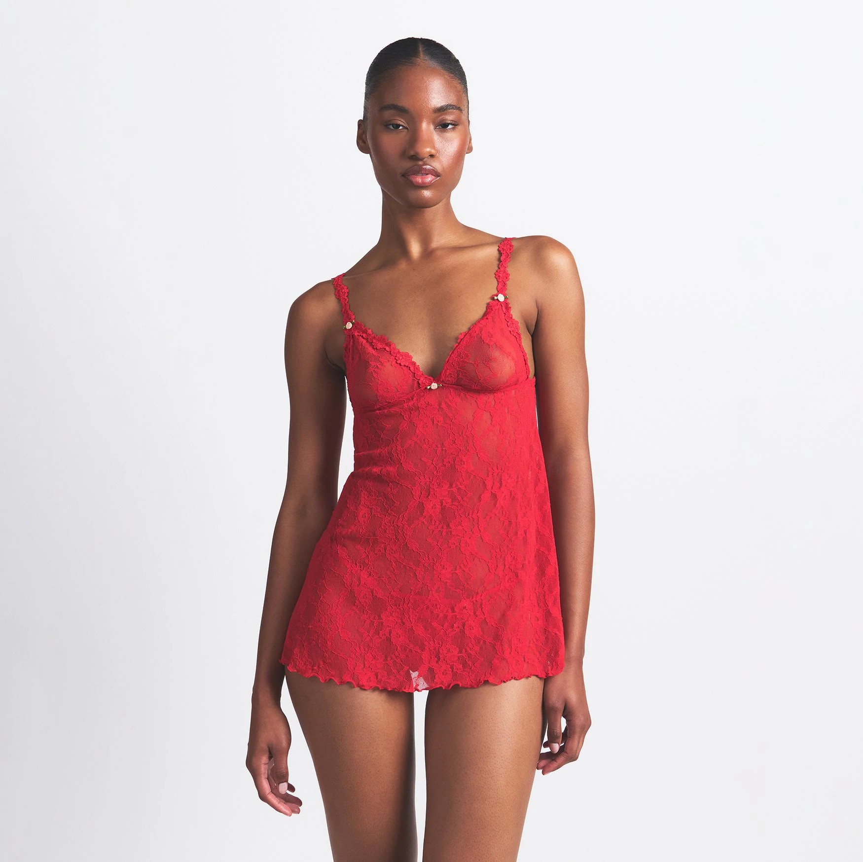 STRETCH LACE SLIP AND THONG SET | RED ON A MODEL FRONT VIEW @ | FOCUS: 0.0, 1.0, 0.9