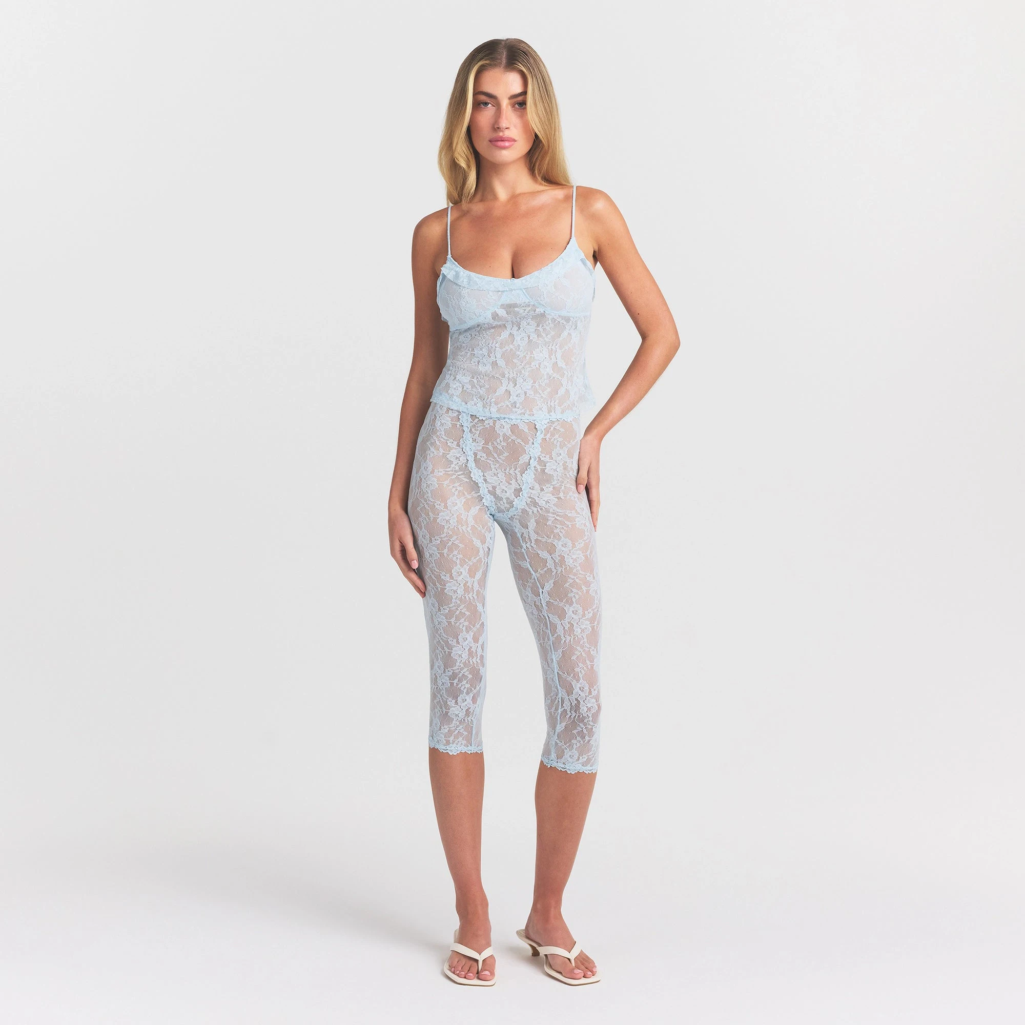 STRETCH LACE RUFFLE CAMI | POWDER BLUE ON A MODEL FRONT VIEW @ | FOCUS: 0.0, 1.0, 0.9