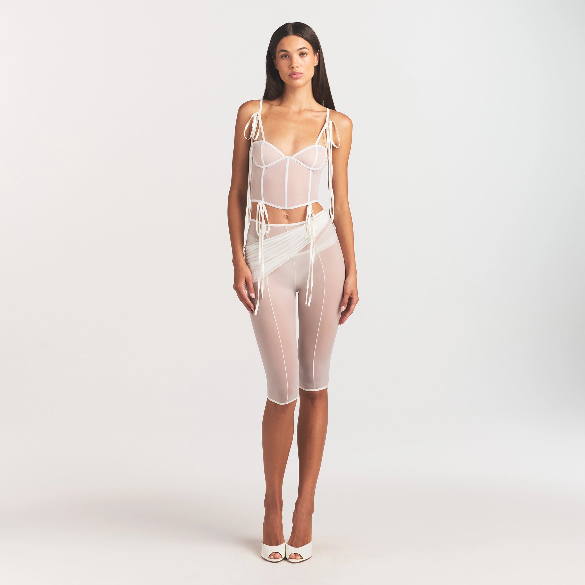 ULTRA FINE MESH BOW CORSET | IVORY ON A MODEL FRONT VIEW @ | FOCUS: 0.0, 1.0, 0.9