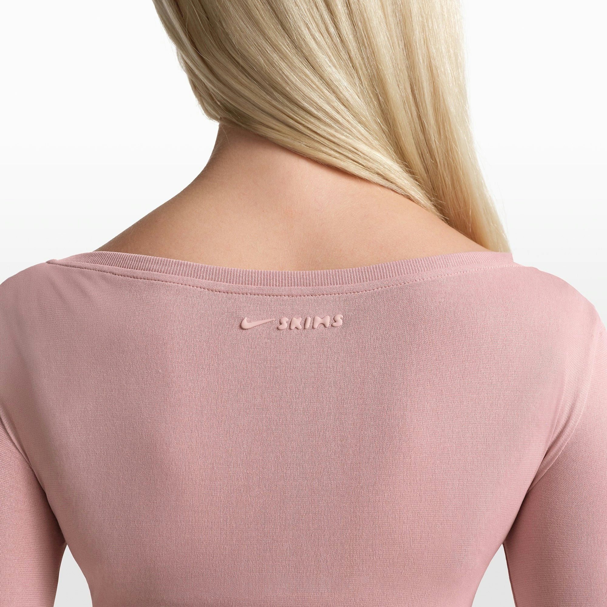 NikeSKIMS STRETCH KNIT WRAP LONG SLEEVE CROPPED TOP | HIMALAYAN ON A MODEL FRONT VIEW @ | FOCUS: 0.0, 1.0, 0.9