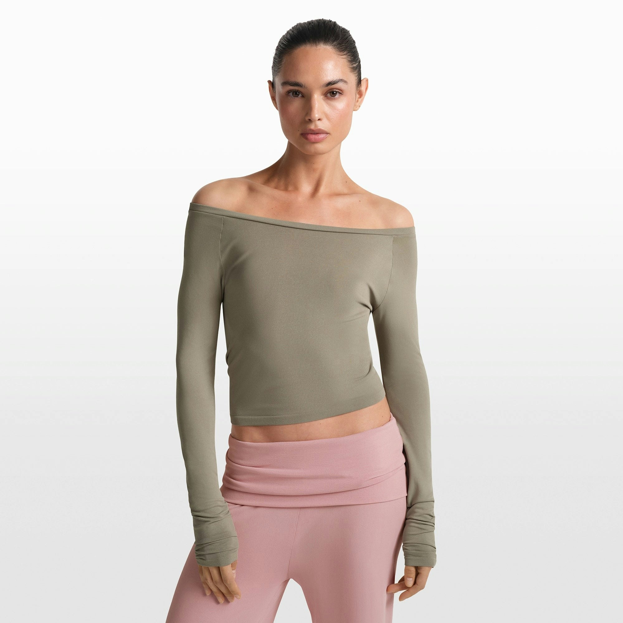 NikeSKIMS STRETCH KNIT LONG SLEEVE BOATNECK TOP | DUNE ON A MODEL FRONT VIEW @ | FOCUS: 0.0, 1.0, 0.9